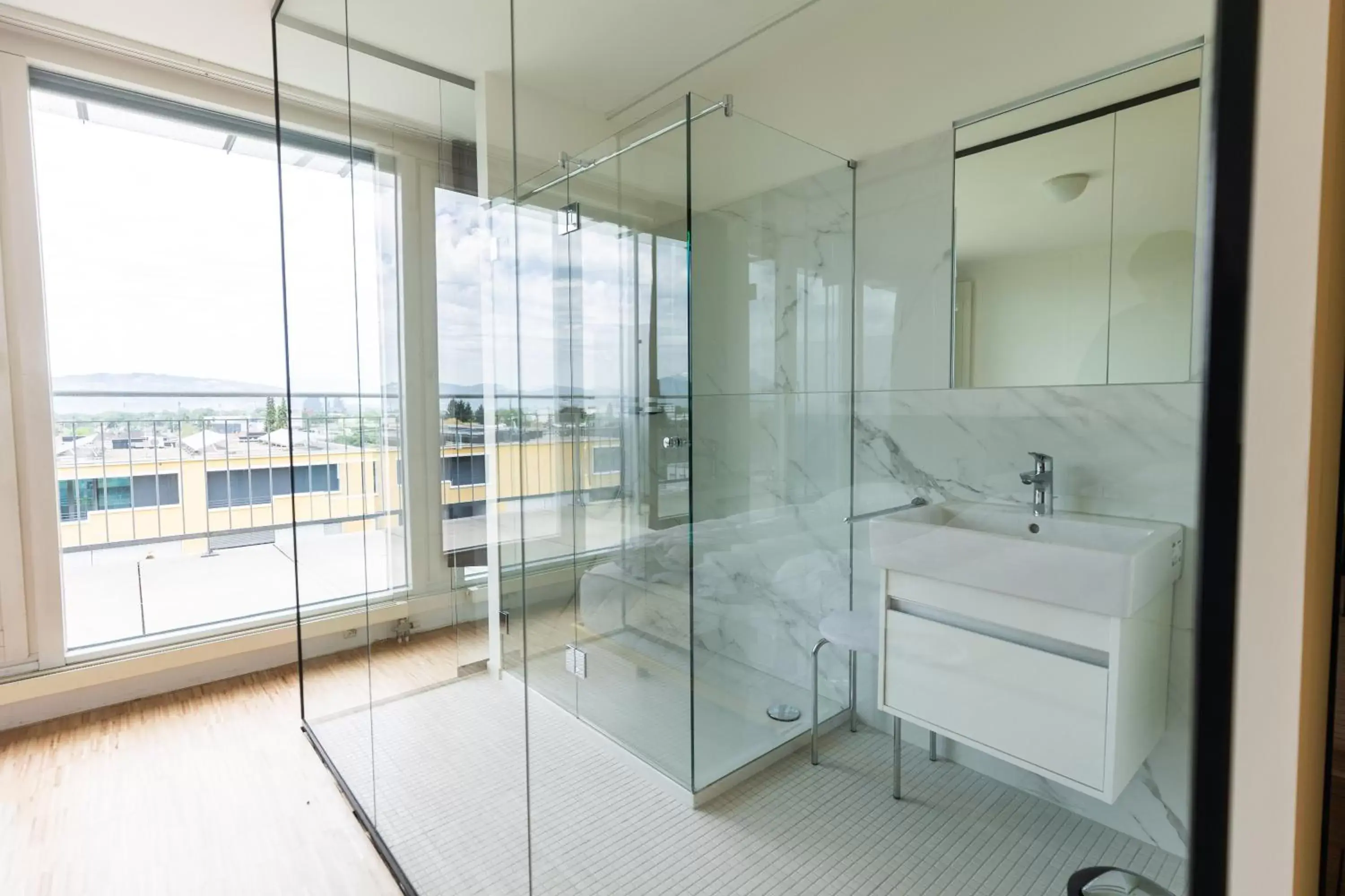 Shower, Bathroom in Vienna House by Wyndham Martinspark Dornbirn