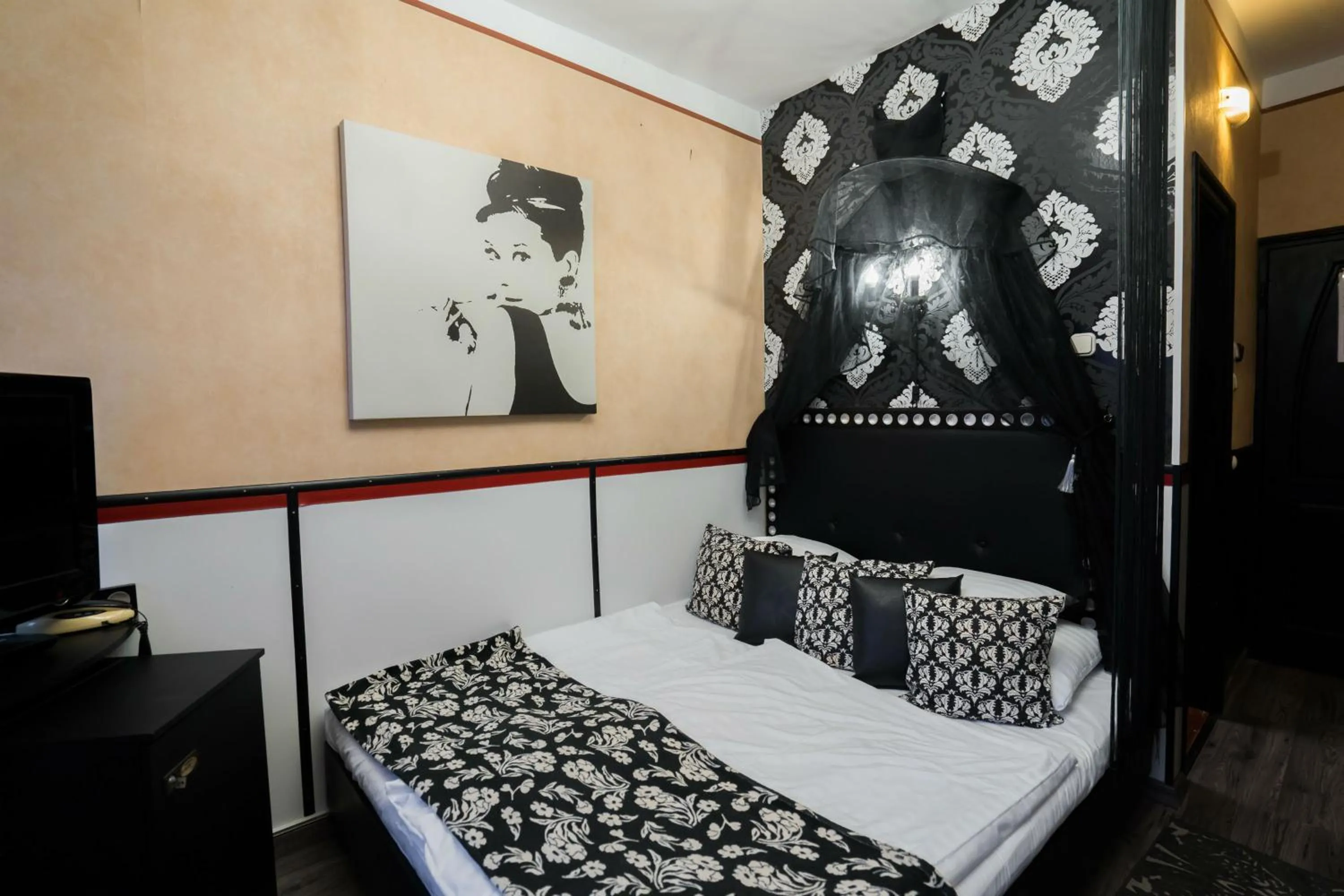 Bed in Janus Boutique Hotel & Spa