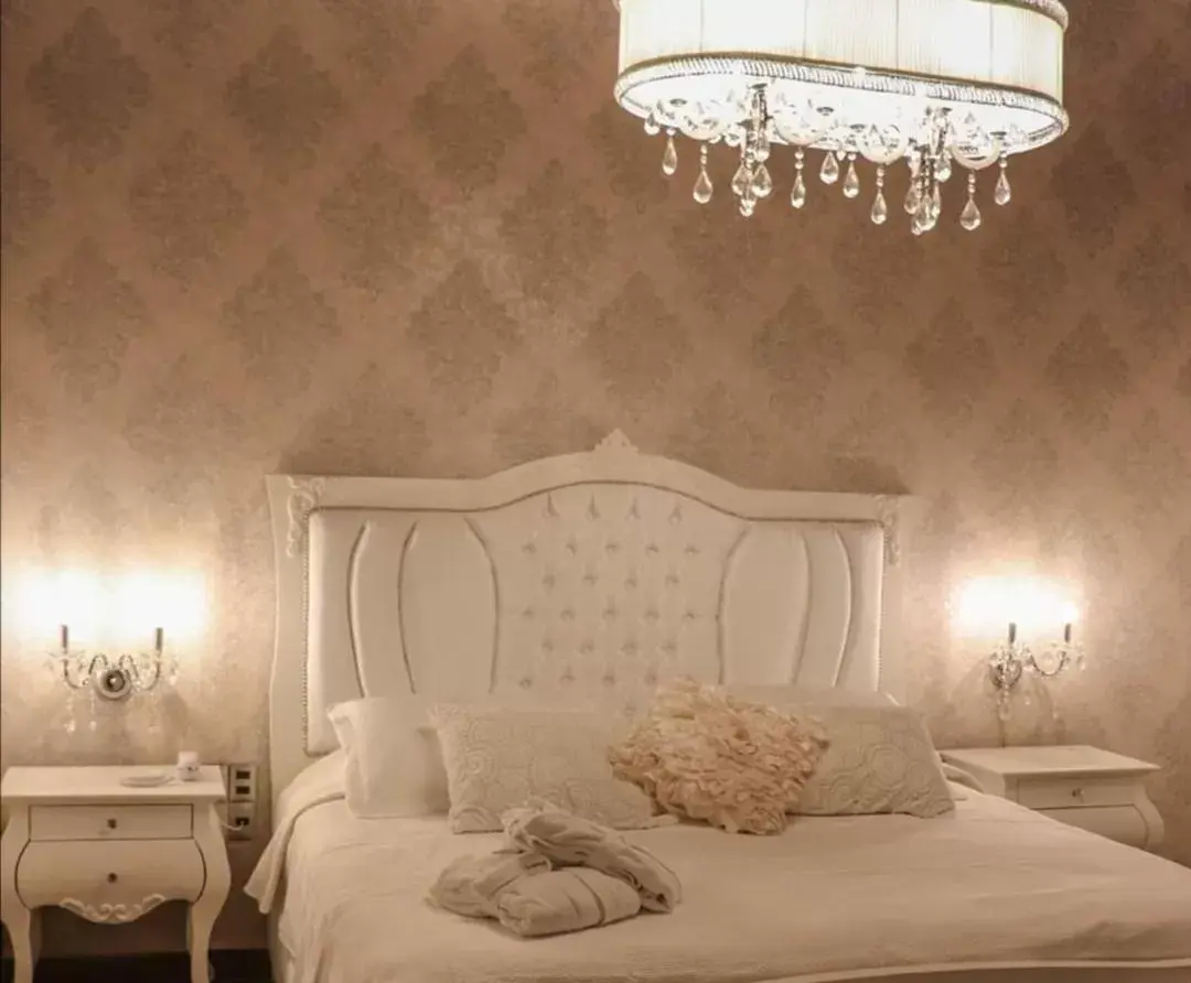 Bed in Hotel Boutique Amorini