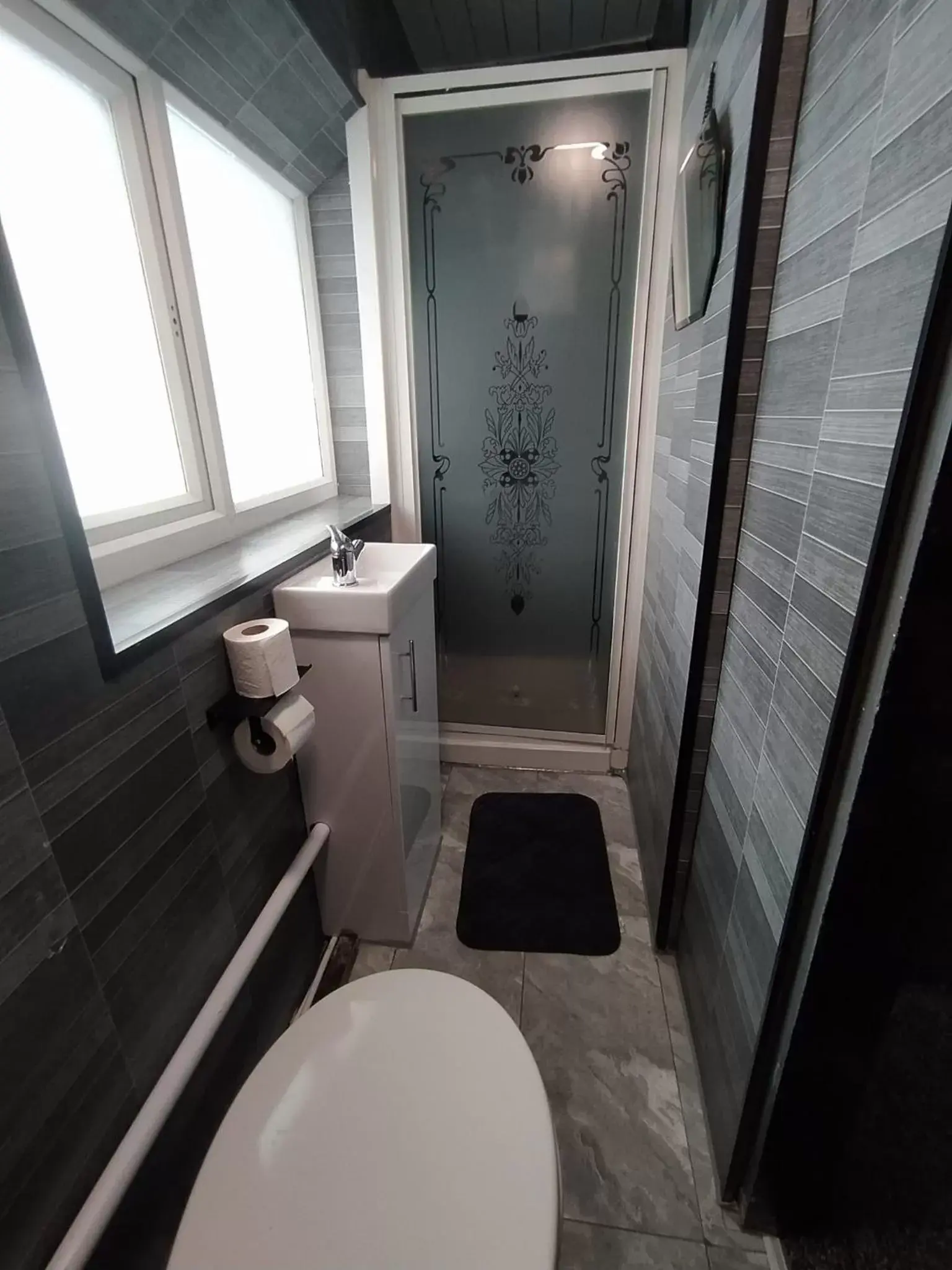 Bathroom in Black Ocean Holiday Apartments