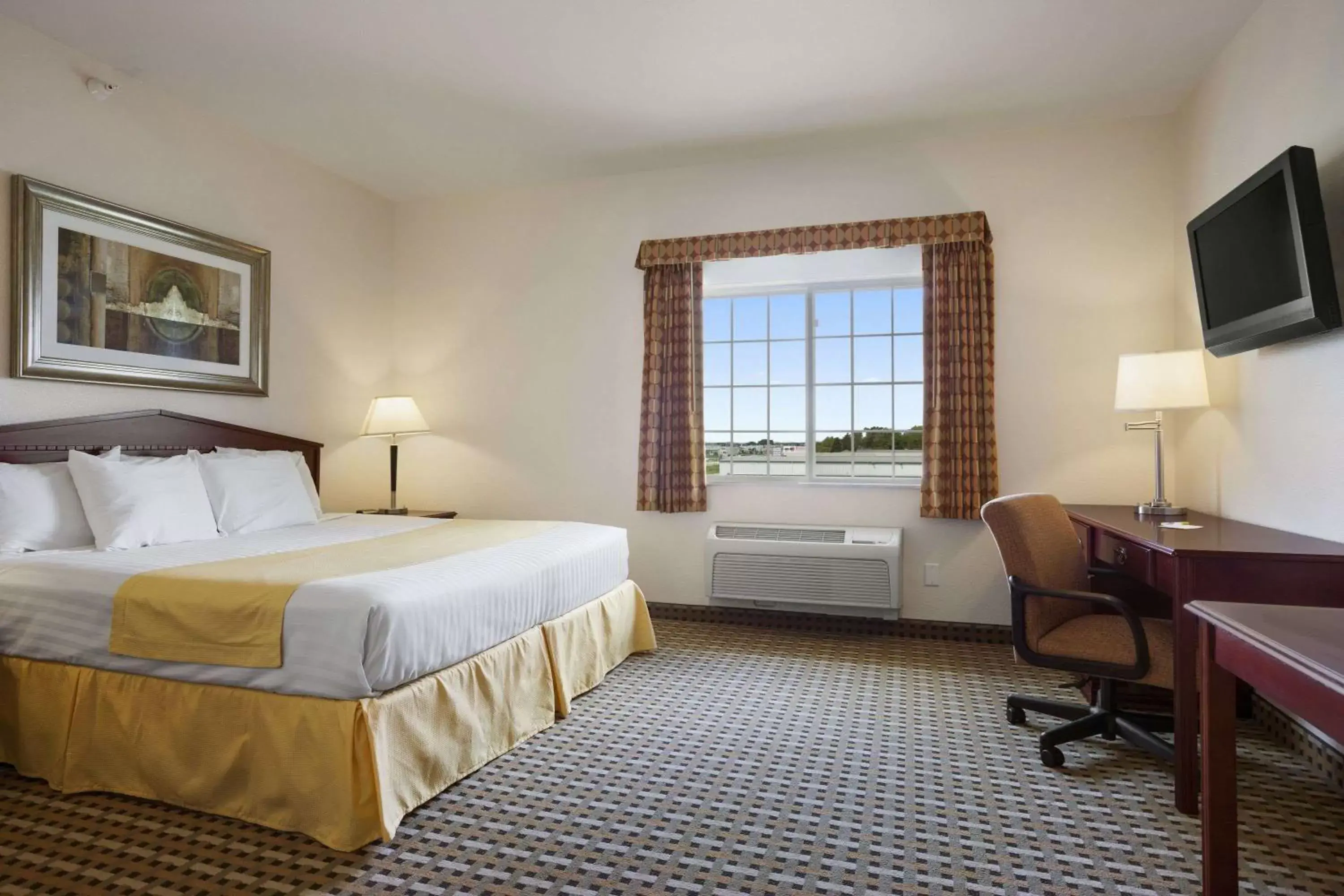 Photo of the whole room, Bed in Days Inn & Suites by Wyndham Columbus NE