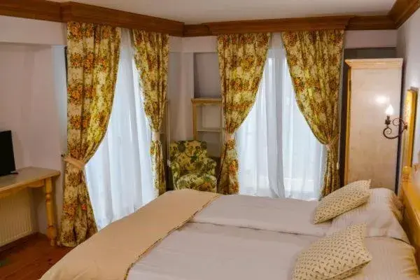 Bed in Casa Comana Boutique Hotel