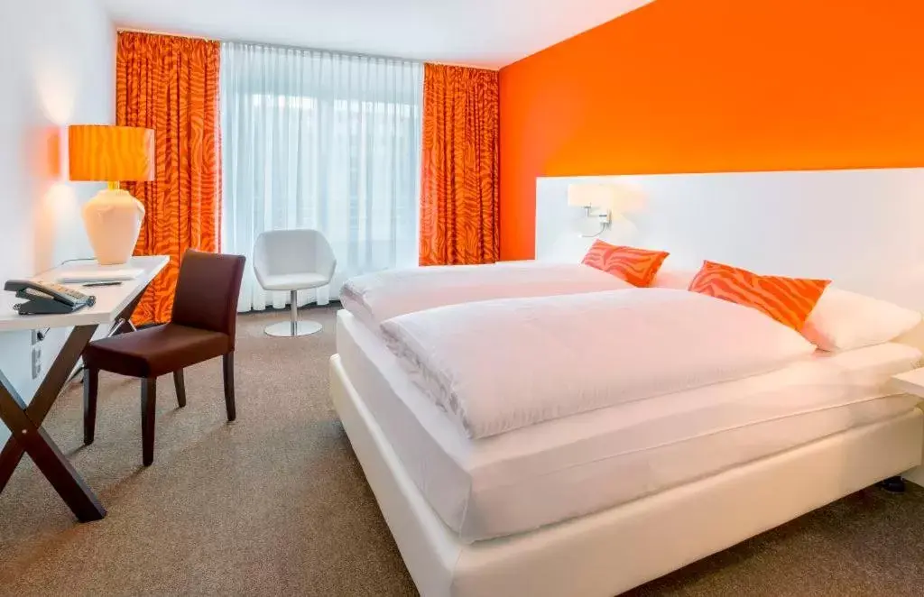 Photo of the whole room, Bed in relexa Hotel Frankfurt am Main (Superior)