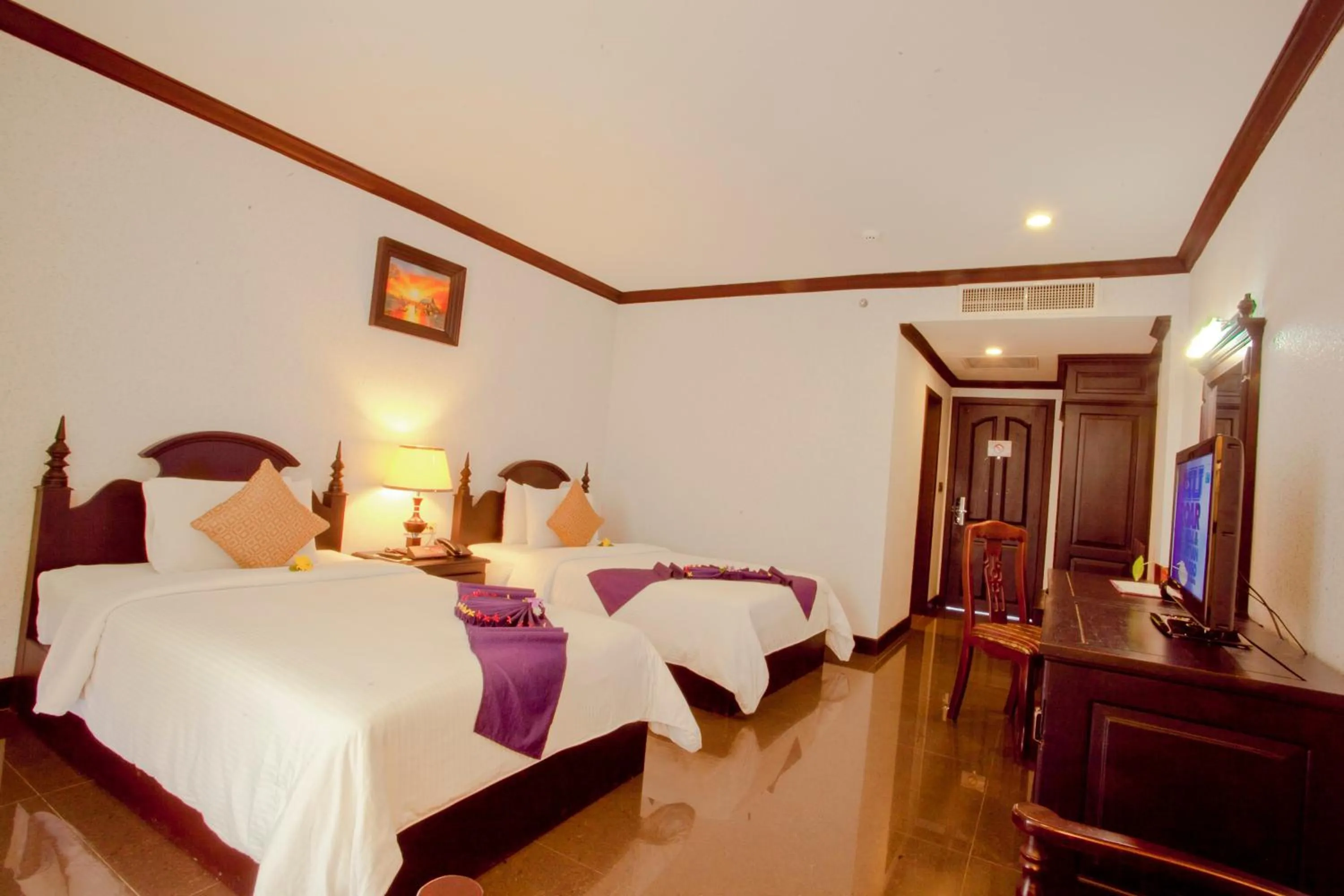 Bed in Lucky Angkor Hotel & Spa