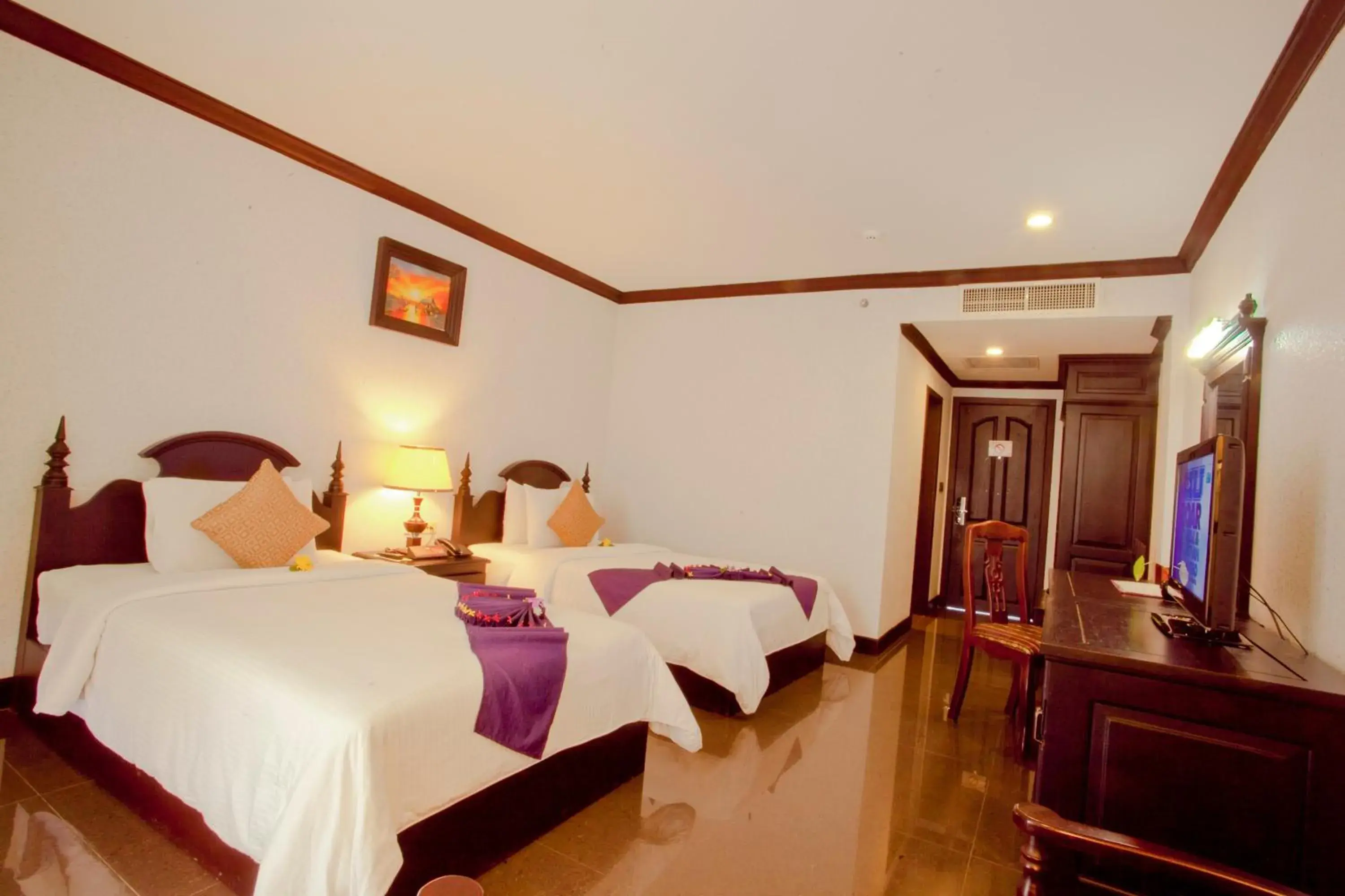 Bed in Lucky Angkor Hotel & Spa