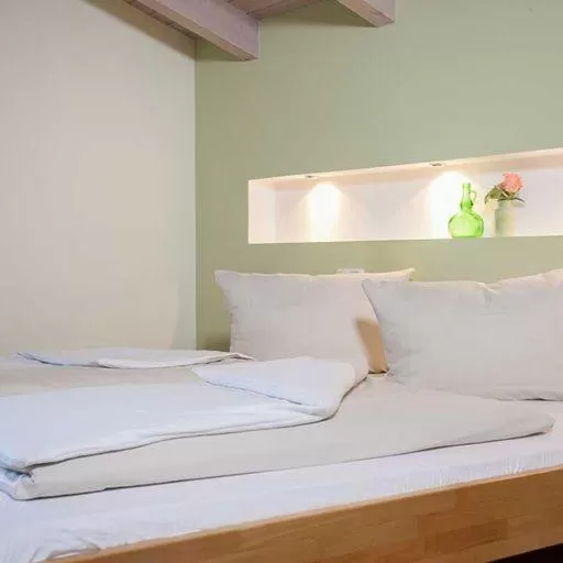 Bed in Hotel Egger-Stüberl
