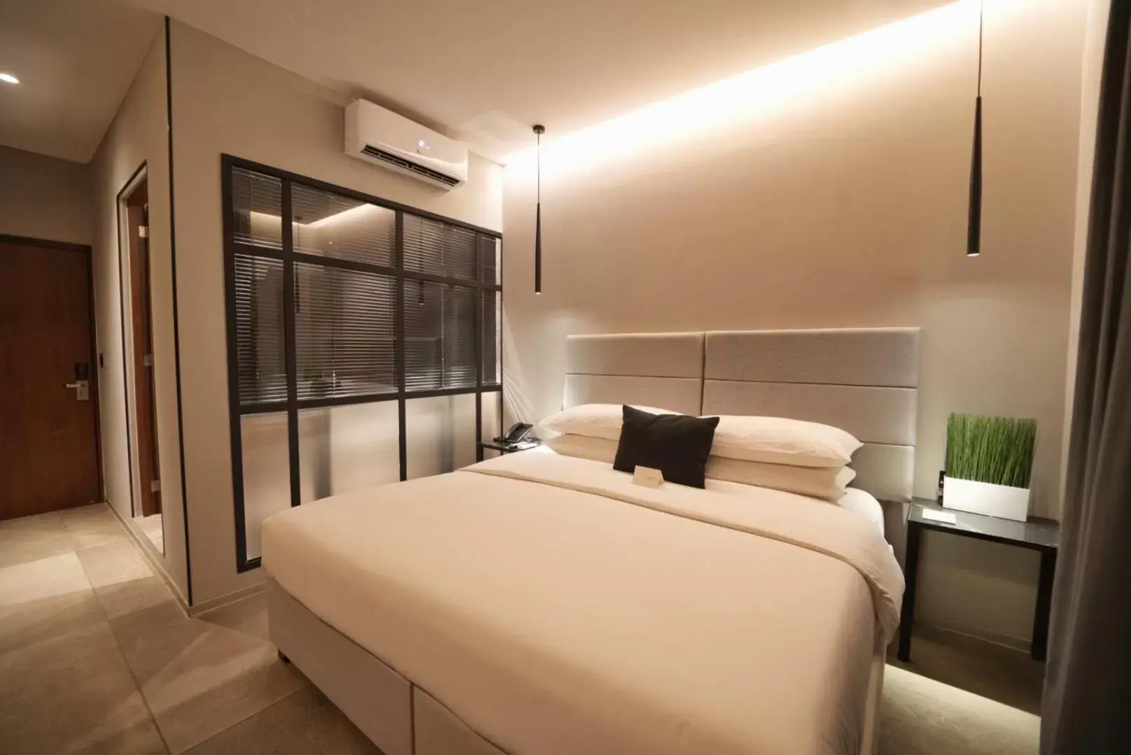 Bed in Ontico Urban Design Hotel