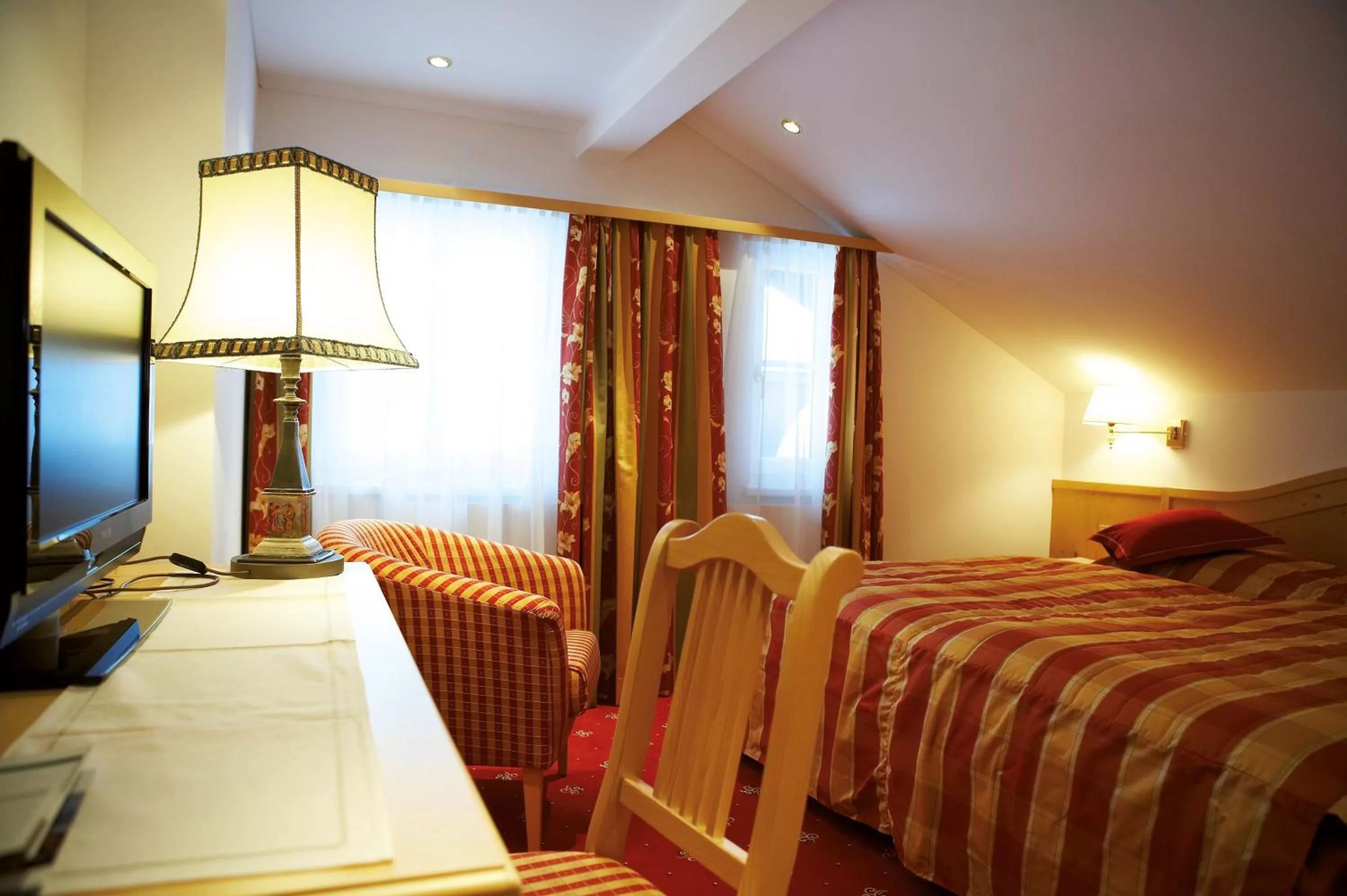 Decorative detail, Bed in Hotel Tannbergerhof im Zentrum von Lech