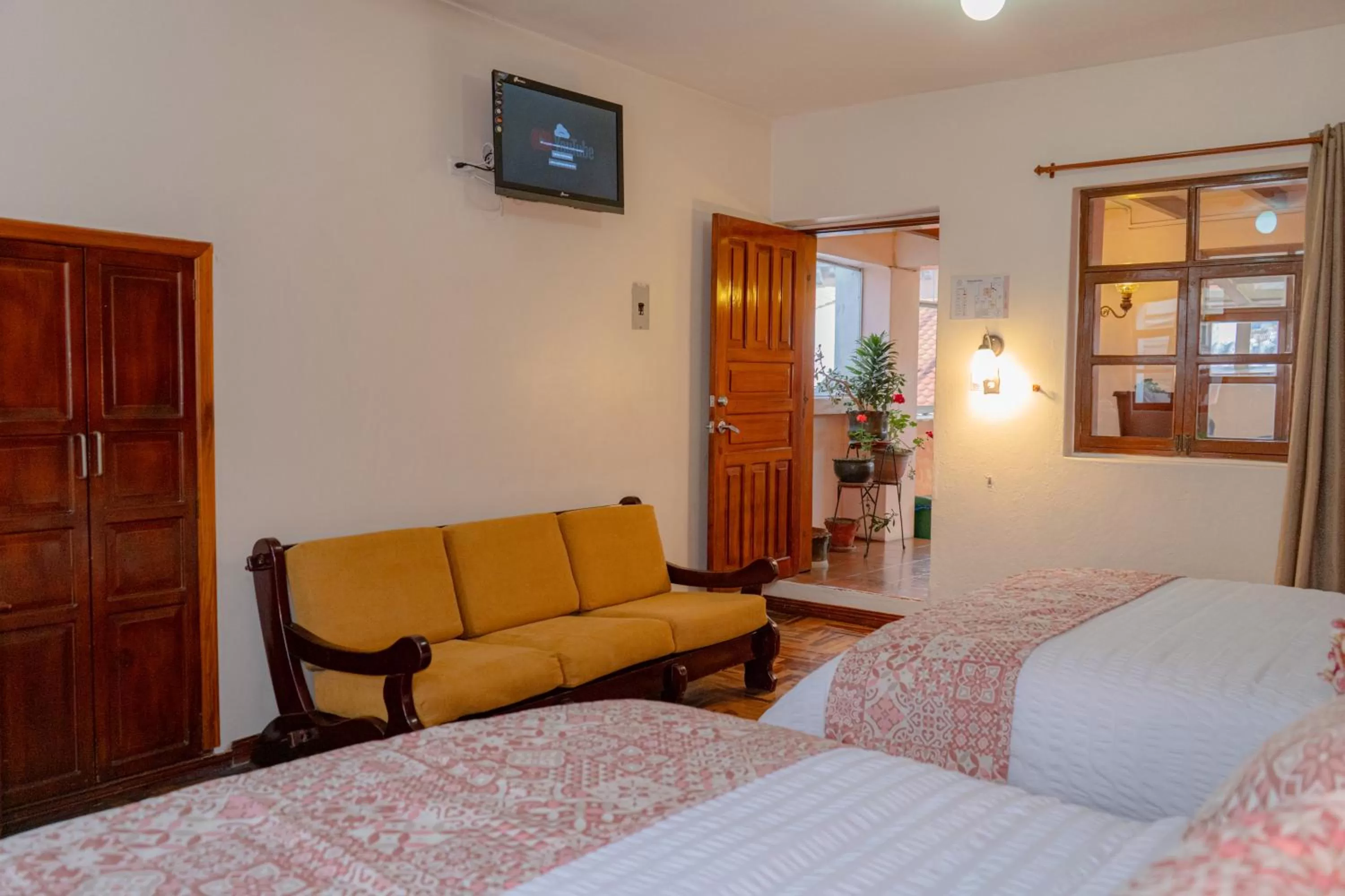 Seating area, Bed in Rincón Familiar Hostel Boutique