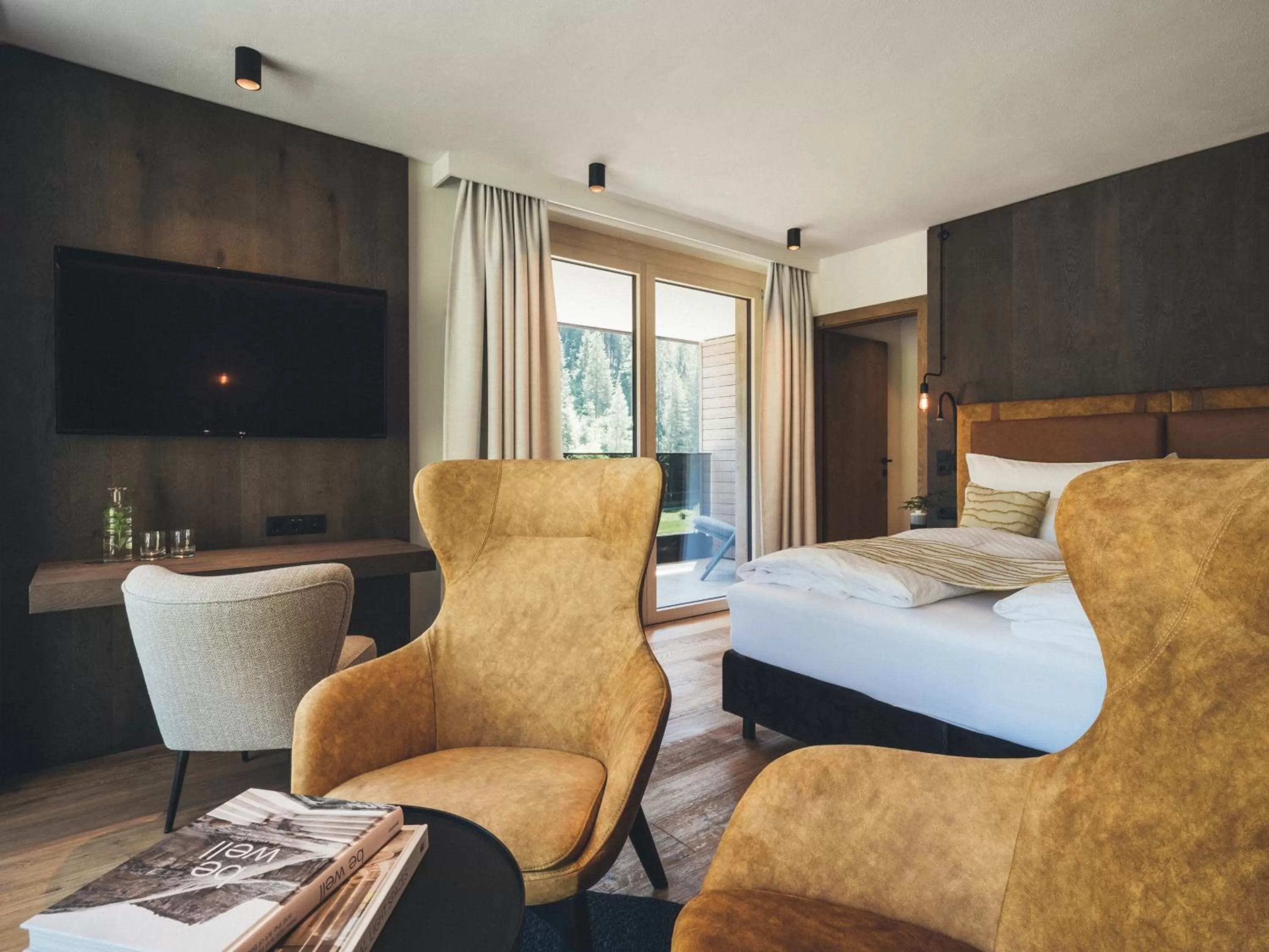 Communal lounge/ TV room, Bed in Hotel Tirolerhof 4 Sterne Superior