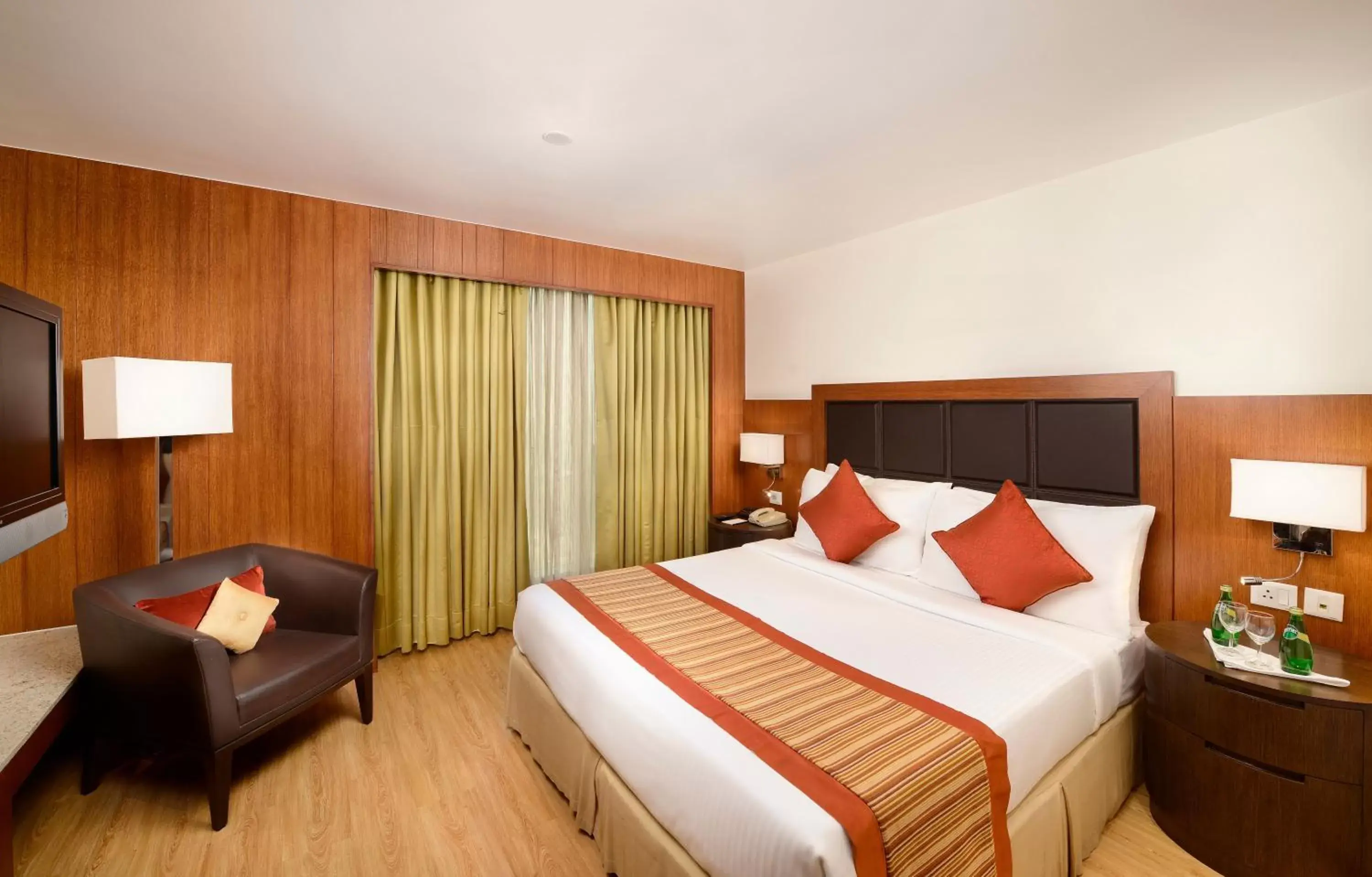 Bed in Svelte Hotel and Personal Suites