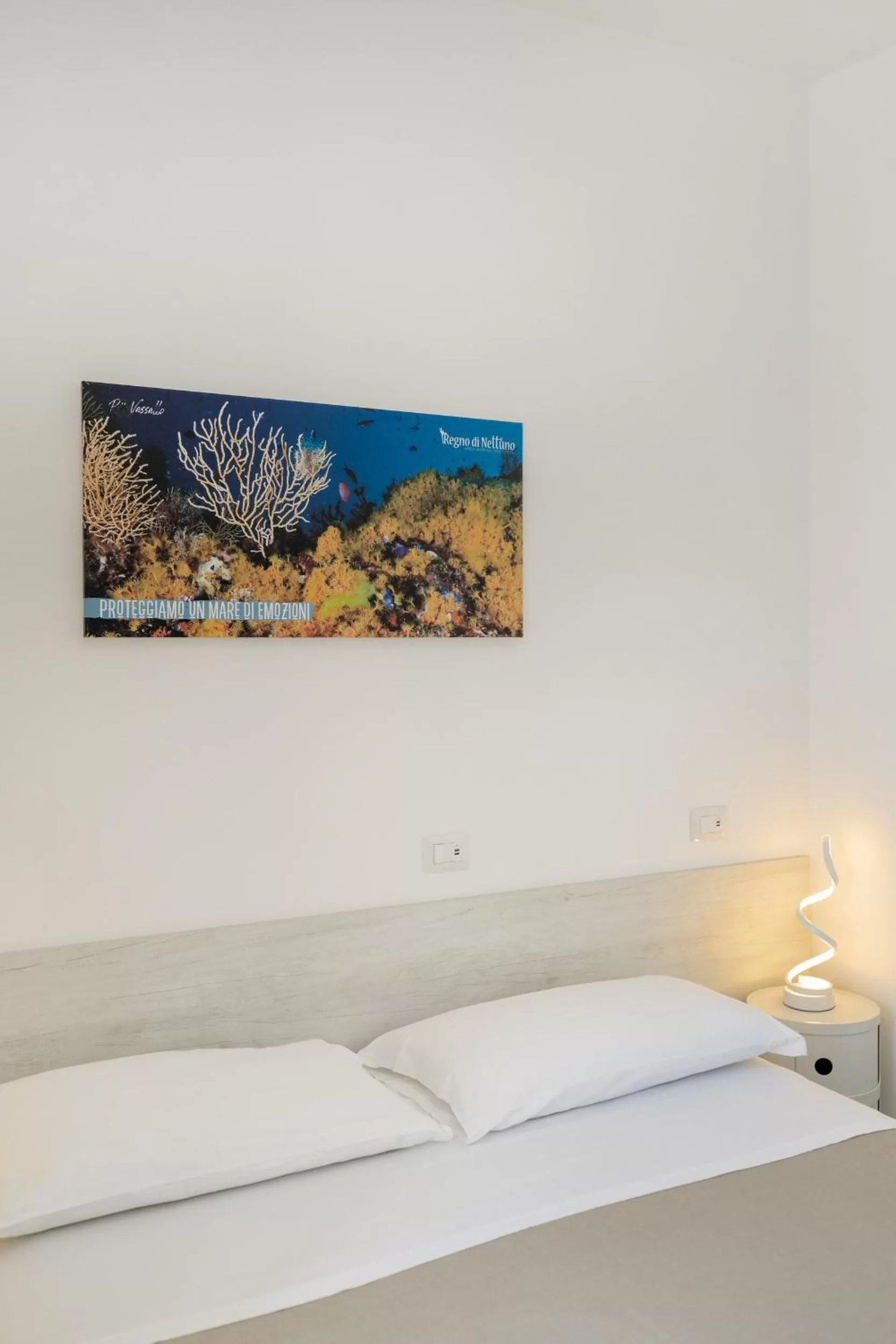 Decorative detail, Bed in Poseidonia Rooms