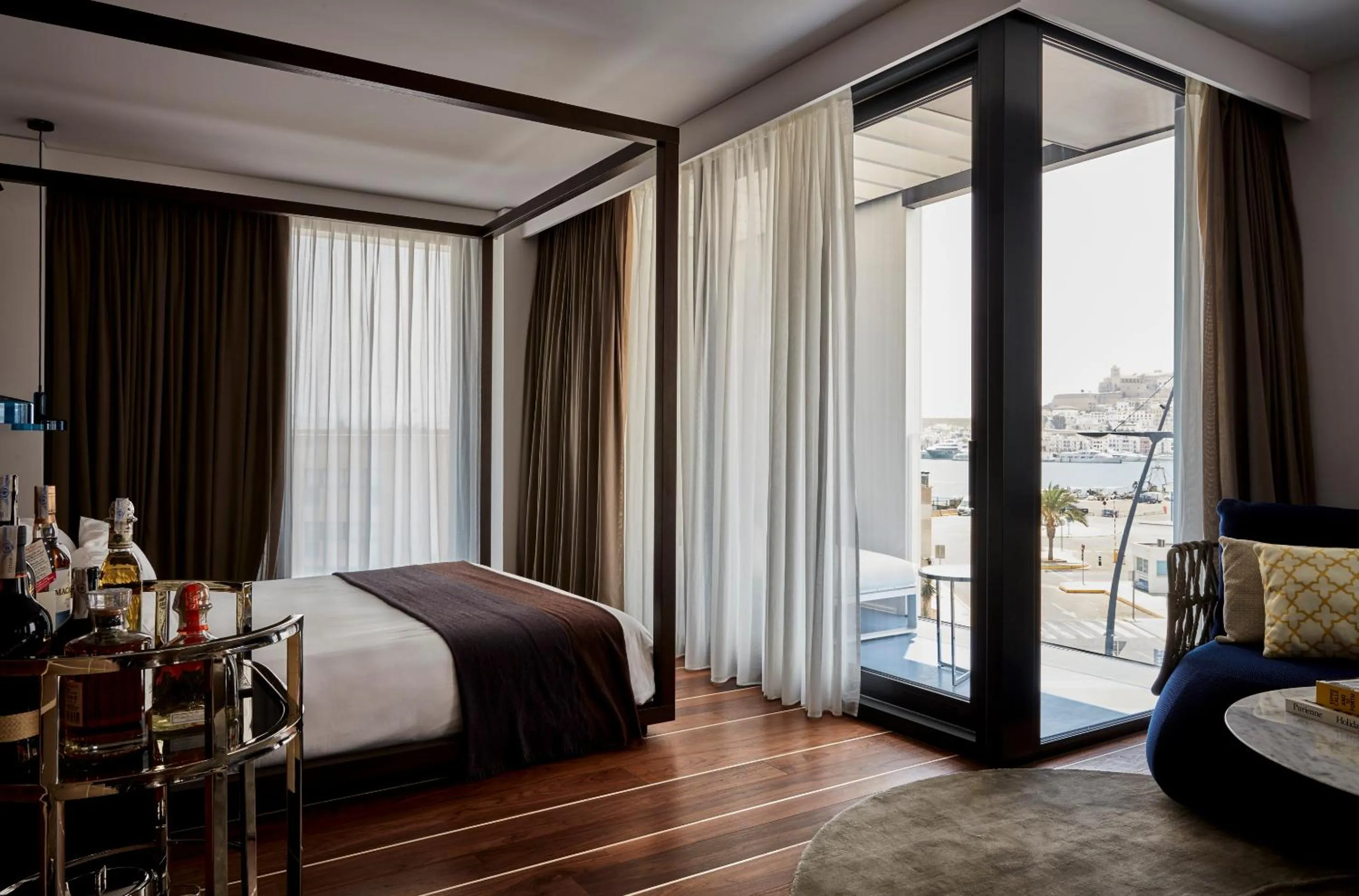 Seating area, Bed in Sir Joan Hotel, part of Sircle Collection