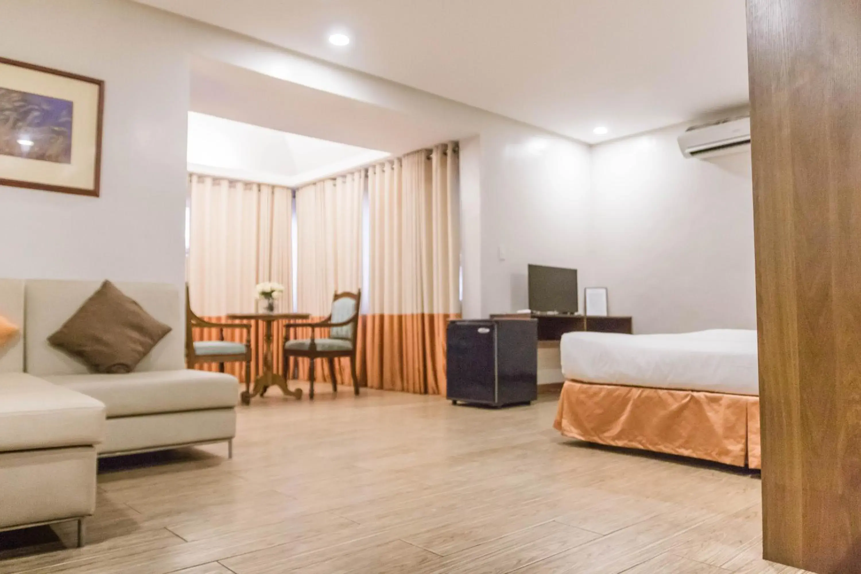 Bedroom, Seating Area in La Fiesta Hotel