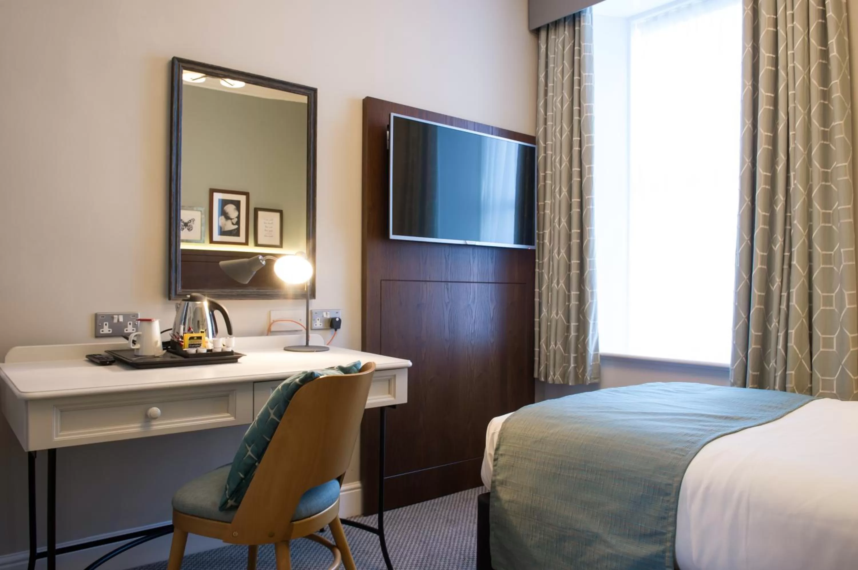 Bed, TV/Entertainment Center in Balloch House by Innkeeper's Collection