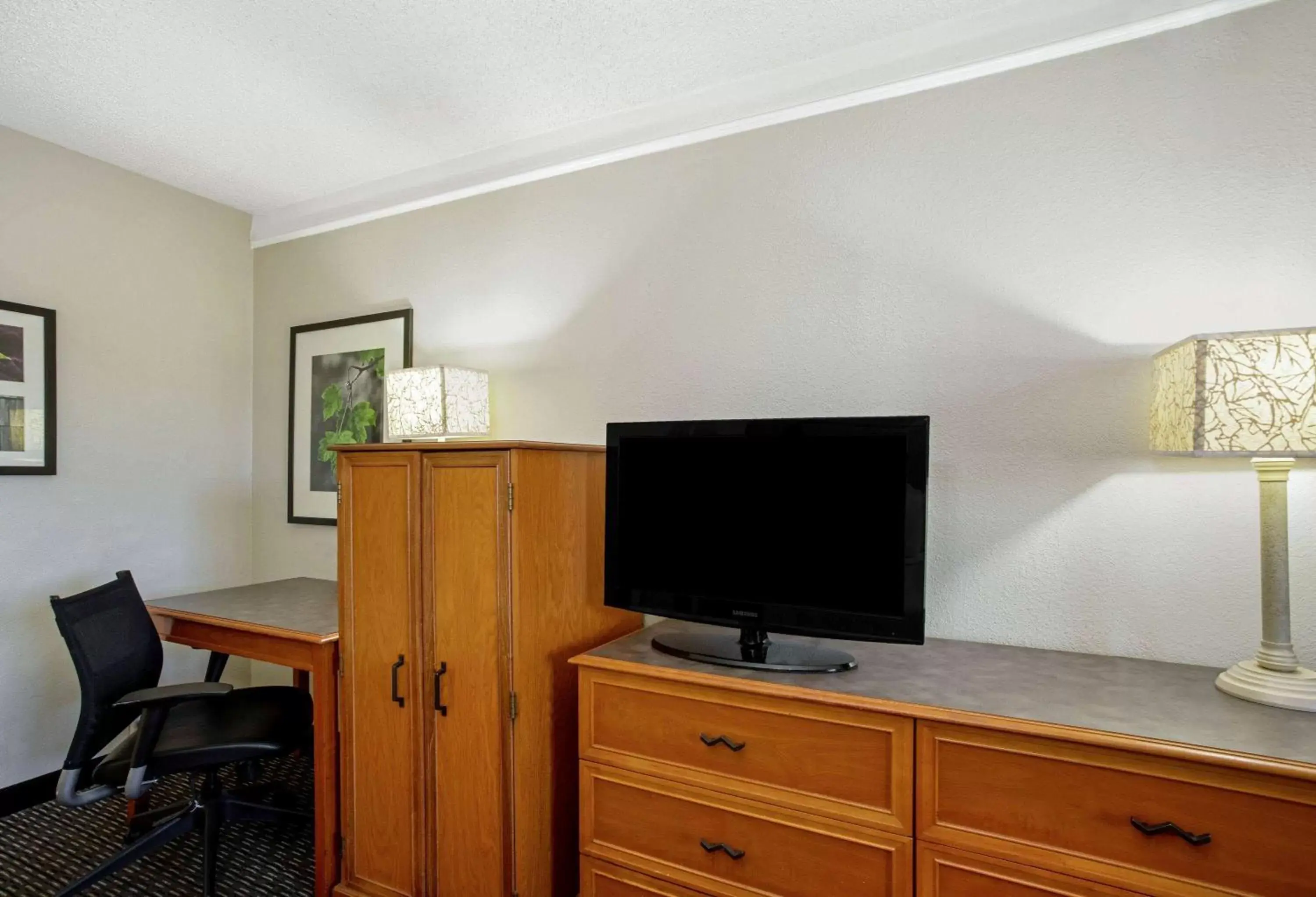 Photo of the whole room, TV/Entertainment Center in La Quinta Inn by Wyndham Tucson East