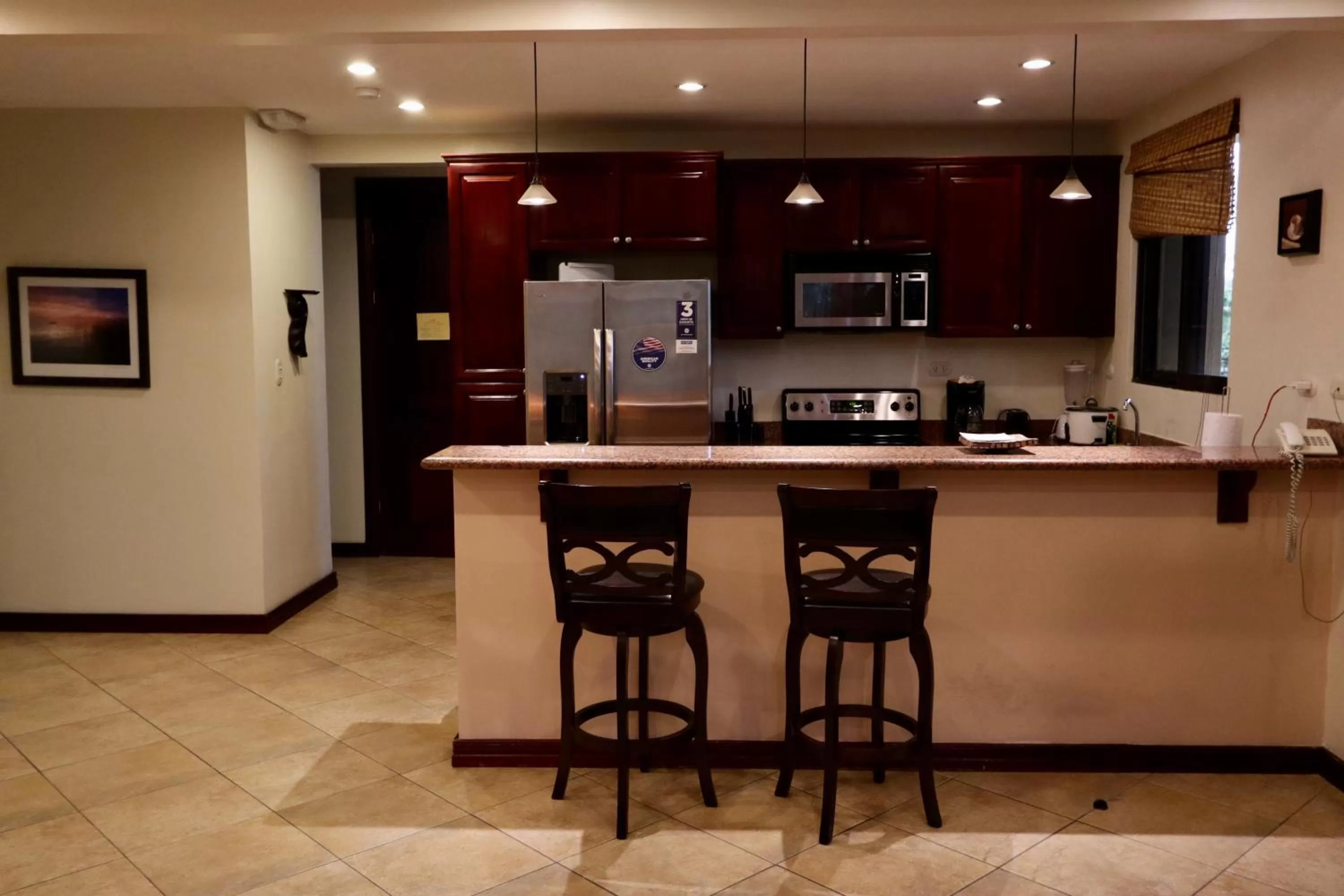 Kitchen or kitchenette in Monte Carlo Luxury Condominiums