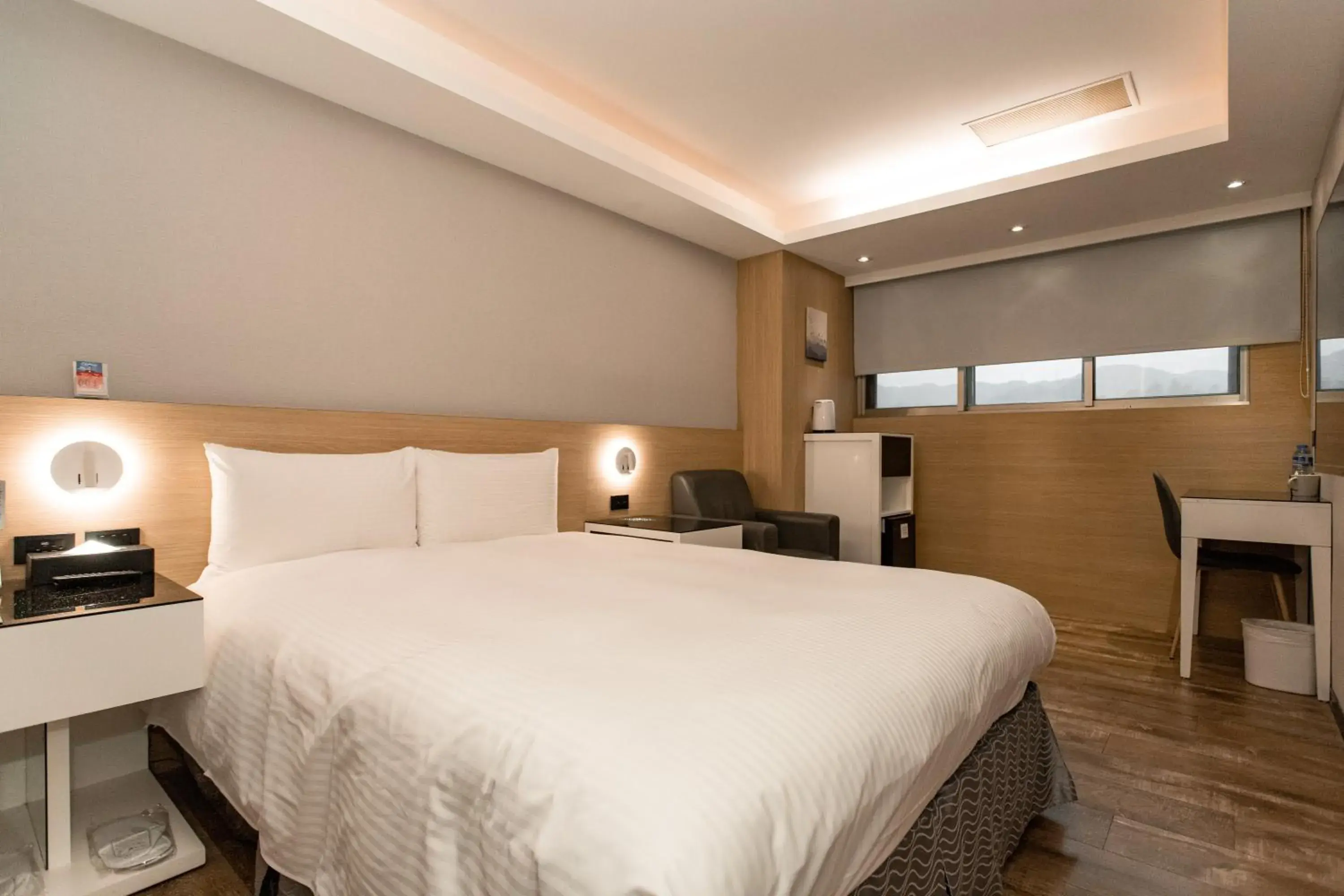 Bed in Hub Hotel Tucheng
