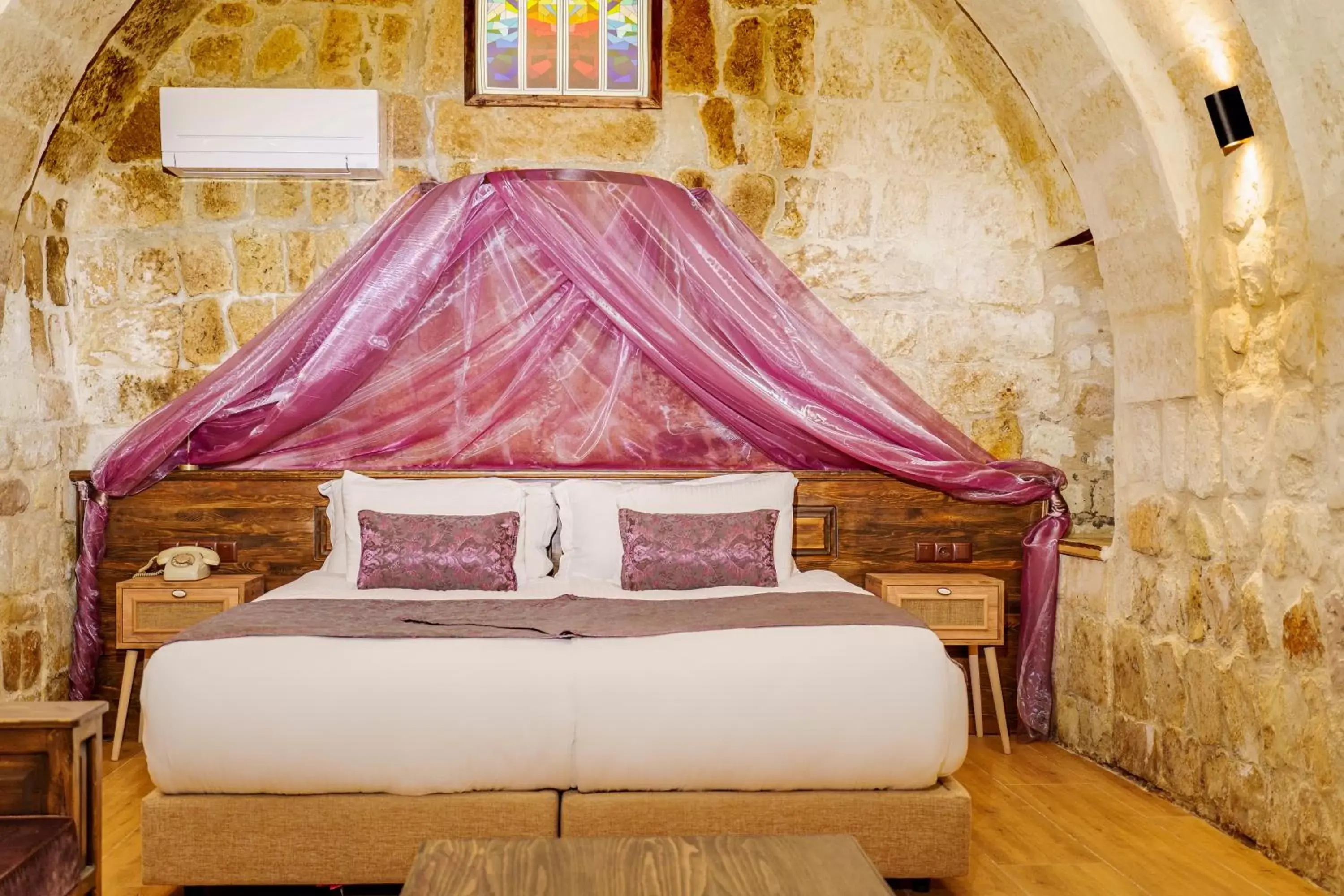 Bed in Fresco Cave Suites Cappadocia