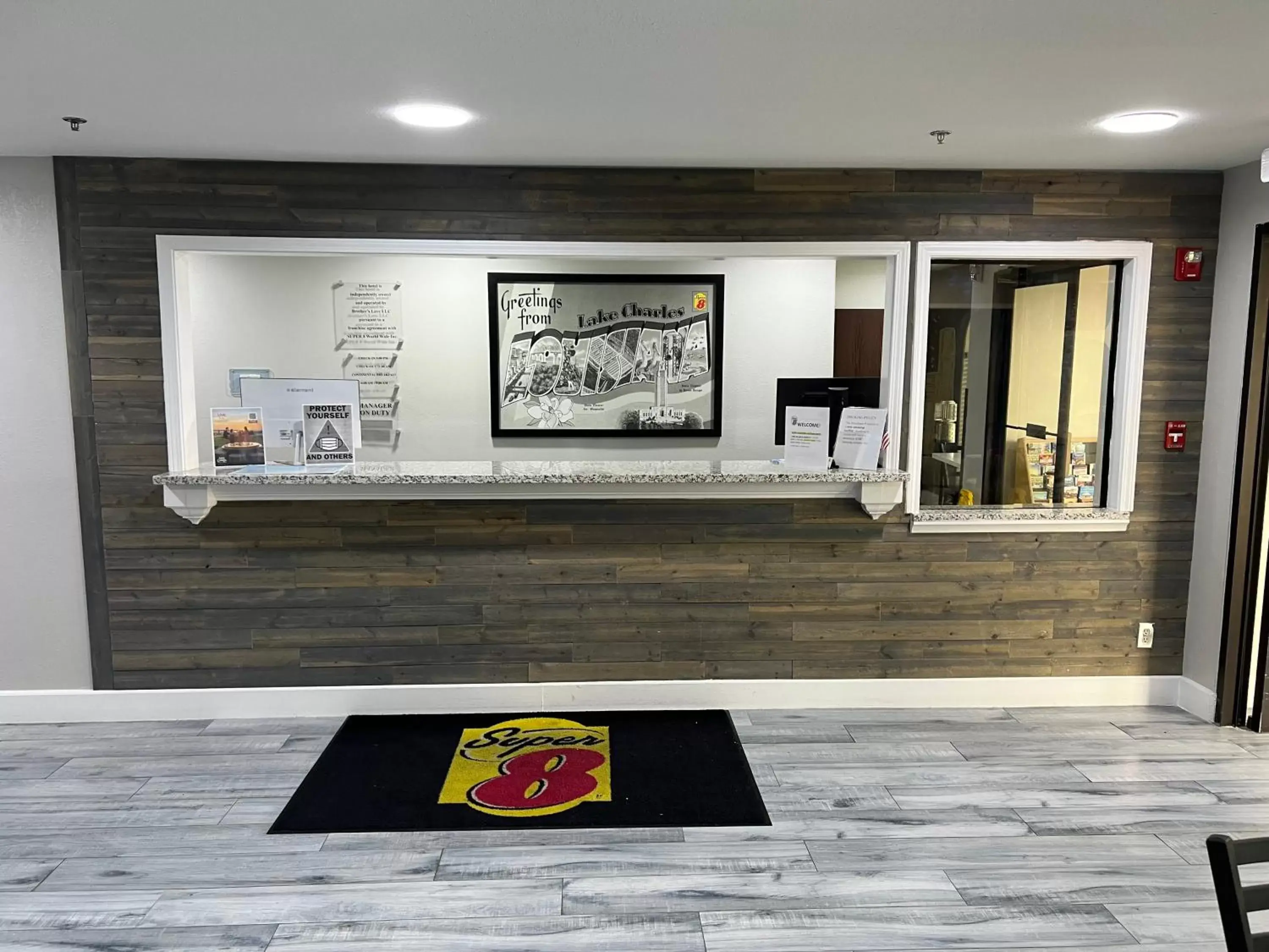 Lobby or reception in Super 8 by Wyndham Lake Charles/Sulphur Lobby or reception in Super 8 by Wyndham Lake Charles/Sulphur
