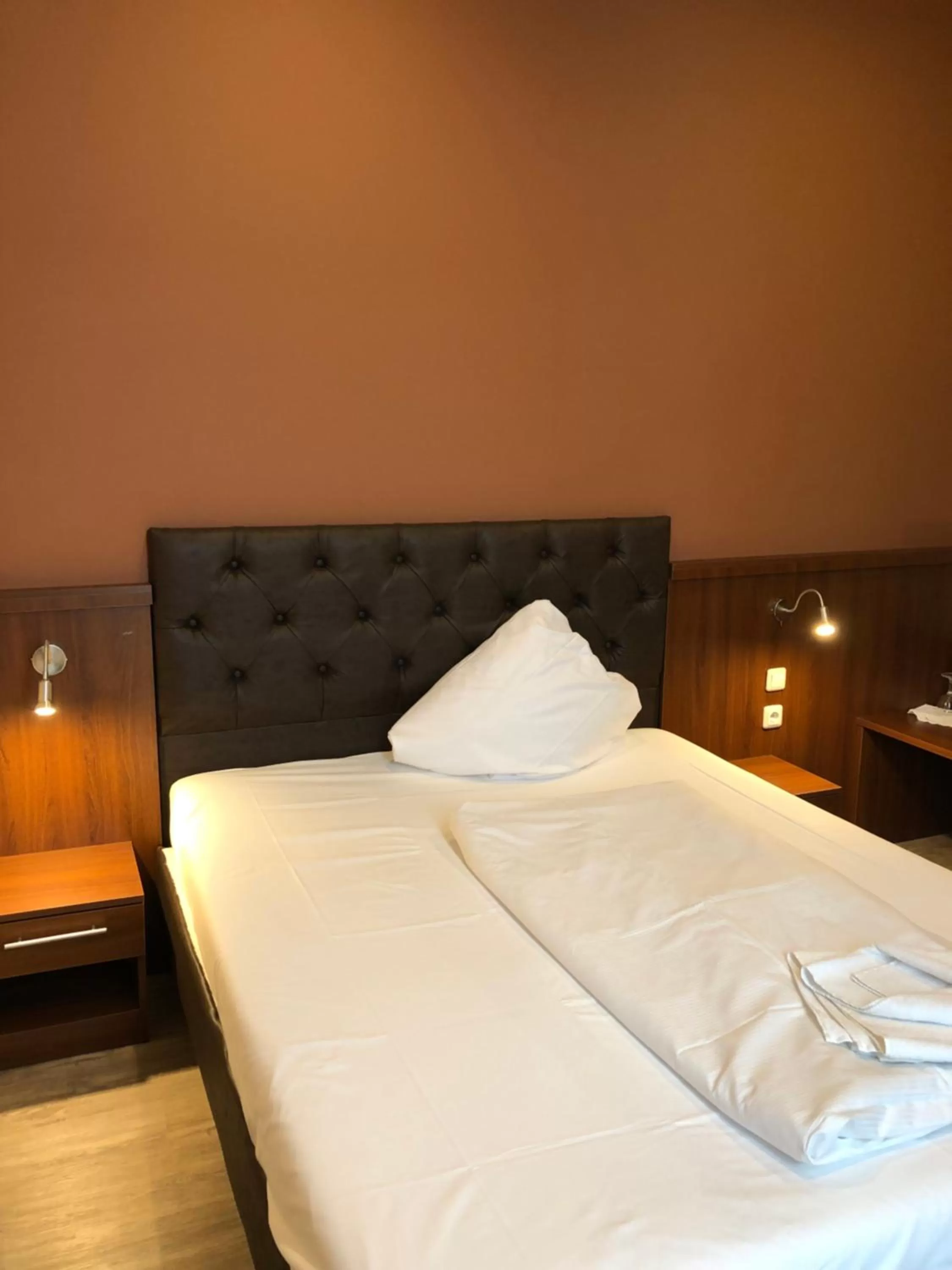 Bed in Hotel Poseidon