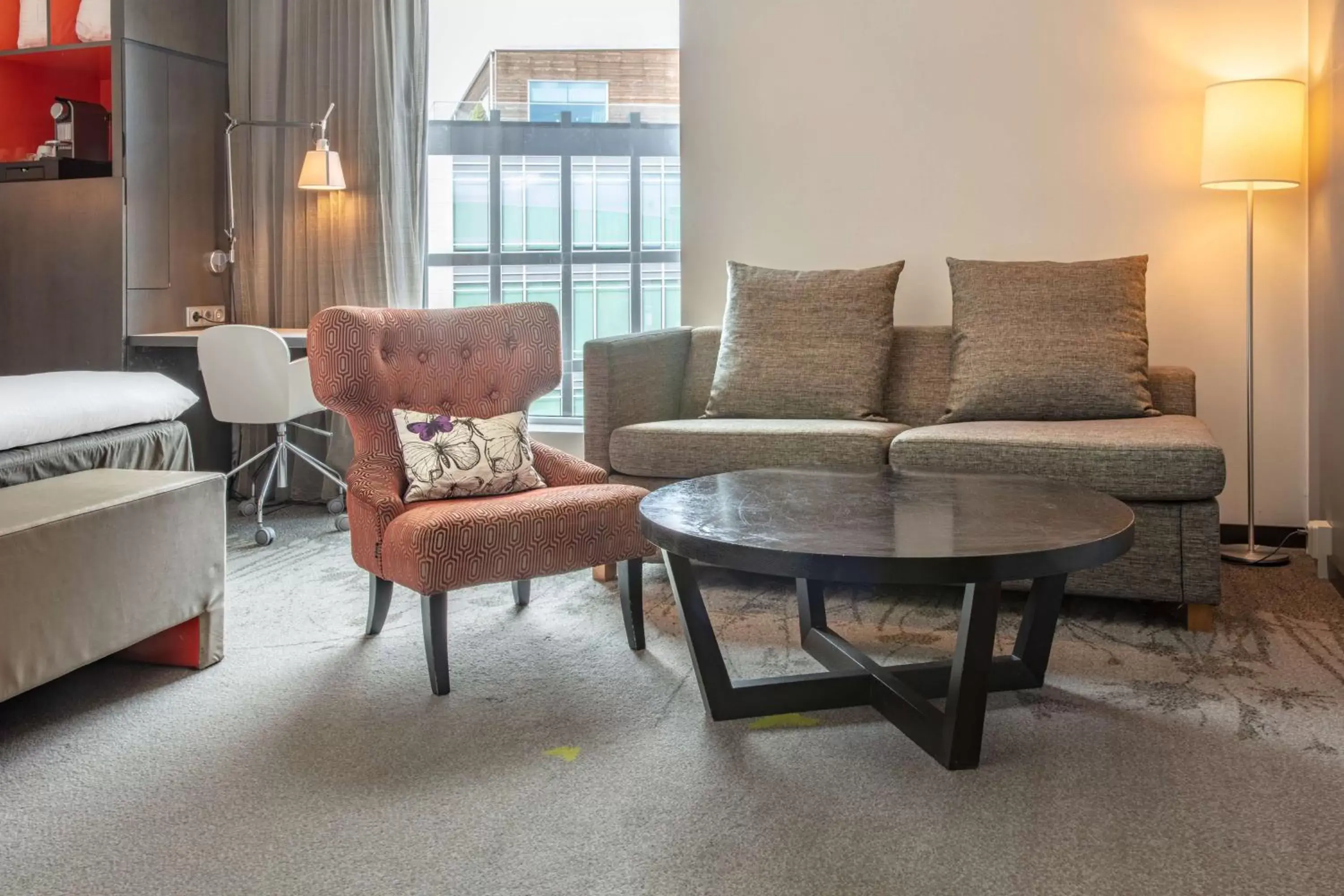 Bed, Seating Area in Radisson Blu Hotel Uppsala