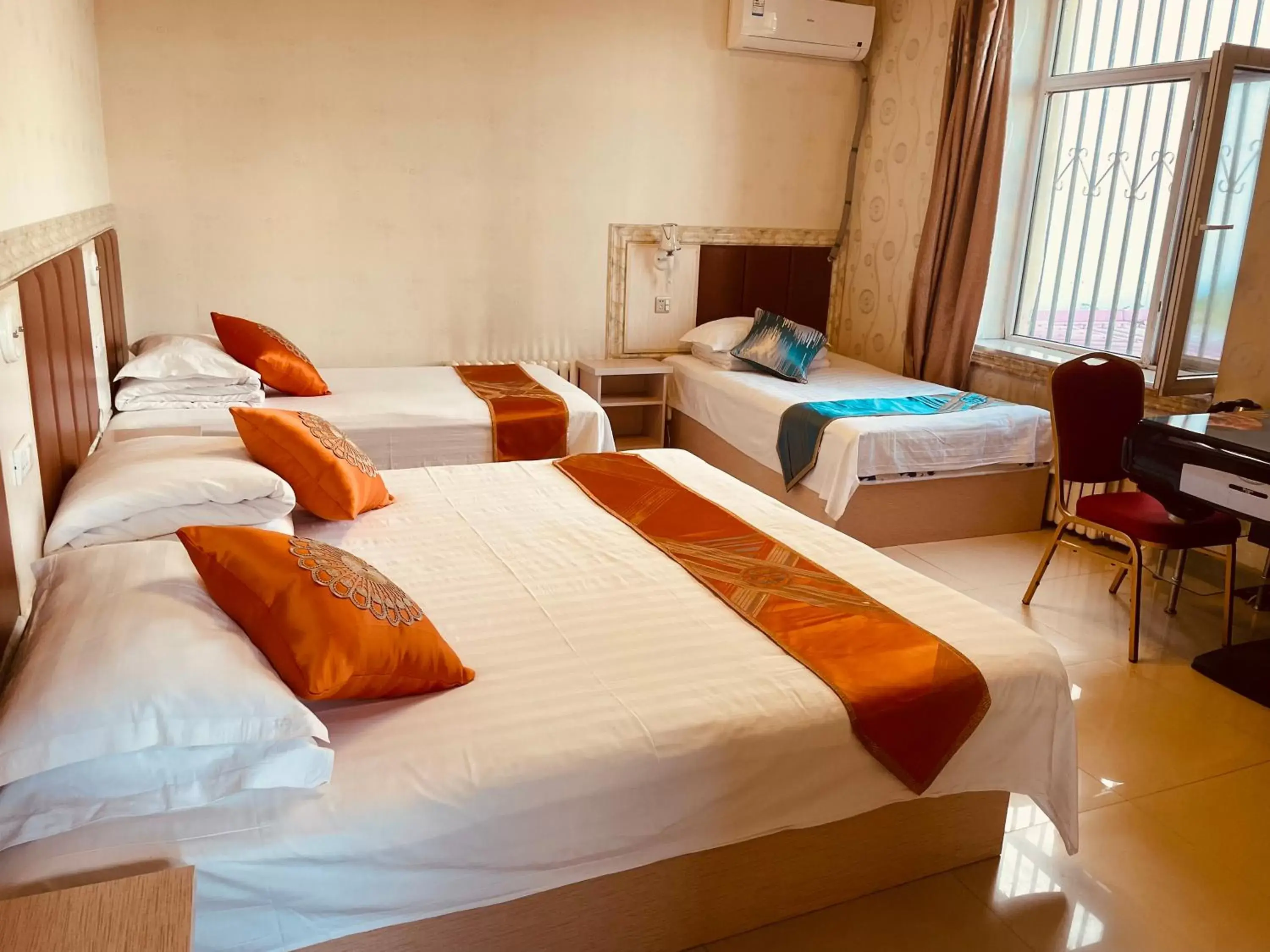 Triple Room in 哈尔滨机场东方红运宾馆 Triple Room in 哈尔滨机场东方红运宾馆