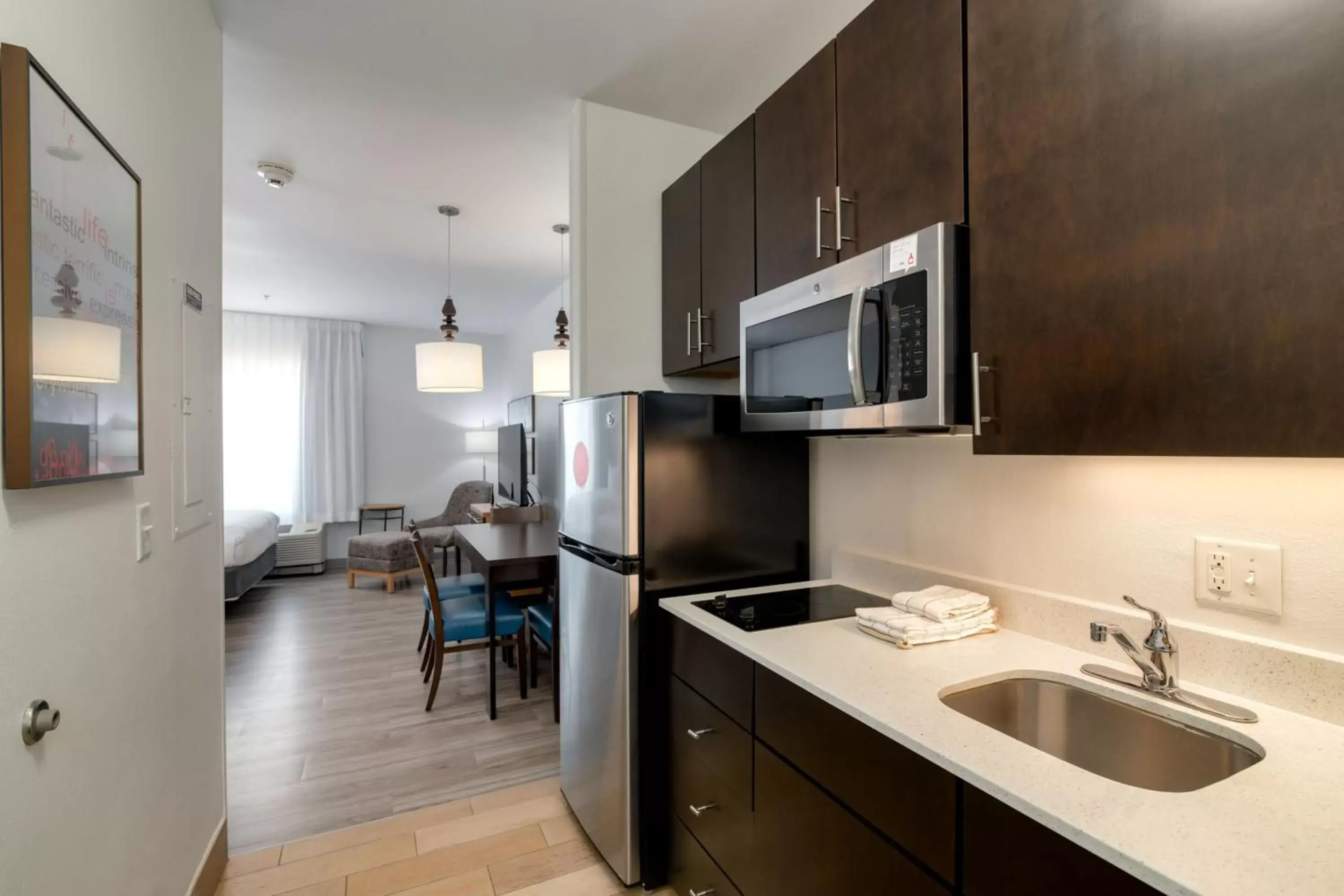 Bedroom, Kitchen/Kitchenette in TownePlace Suites by Marriott Dallas McKinney