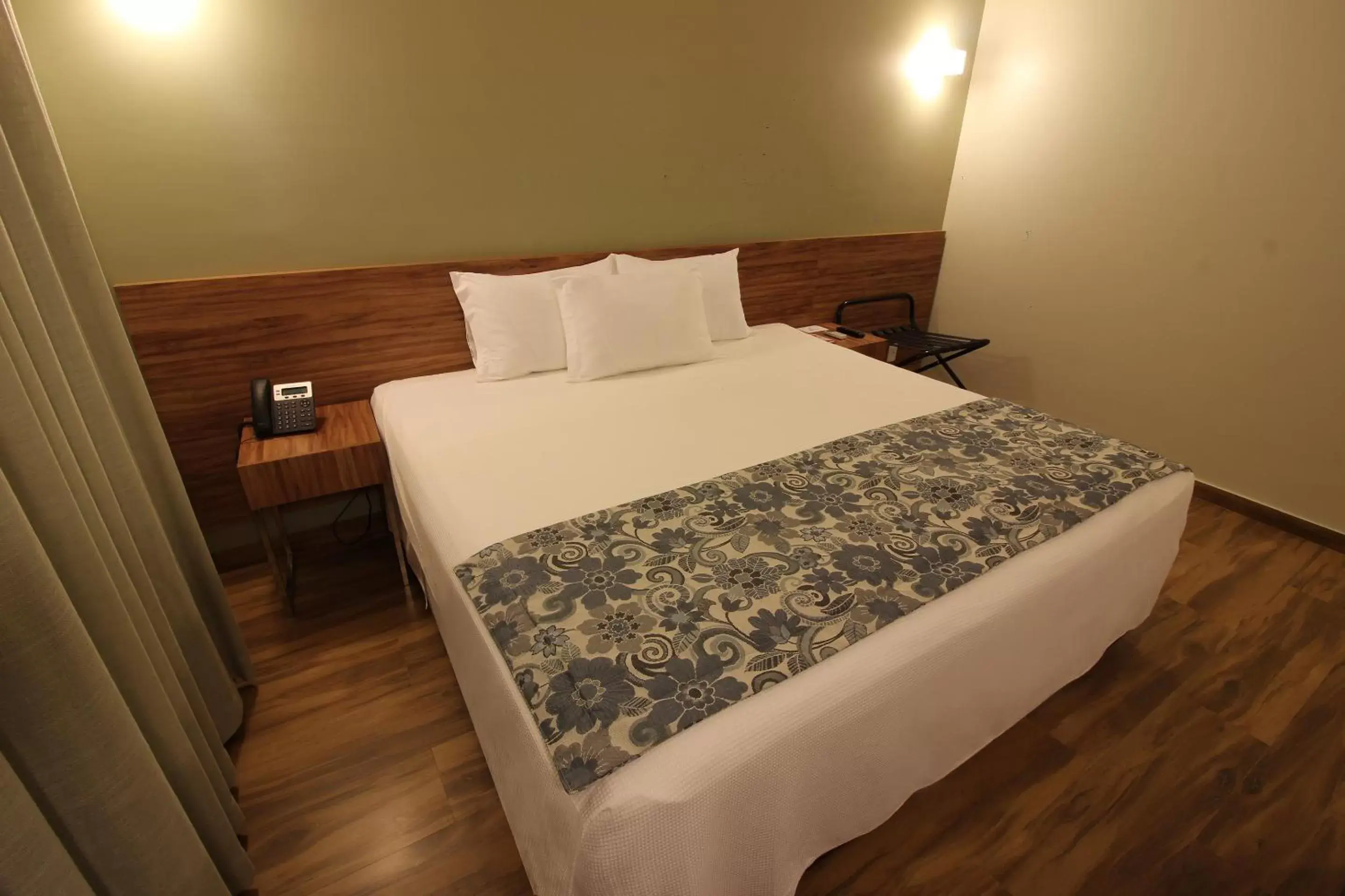 Bed in Impar Suites Barao de Cocais