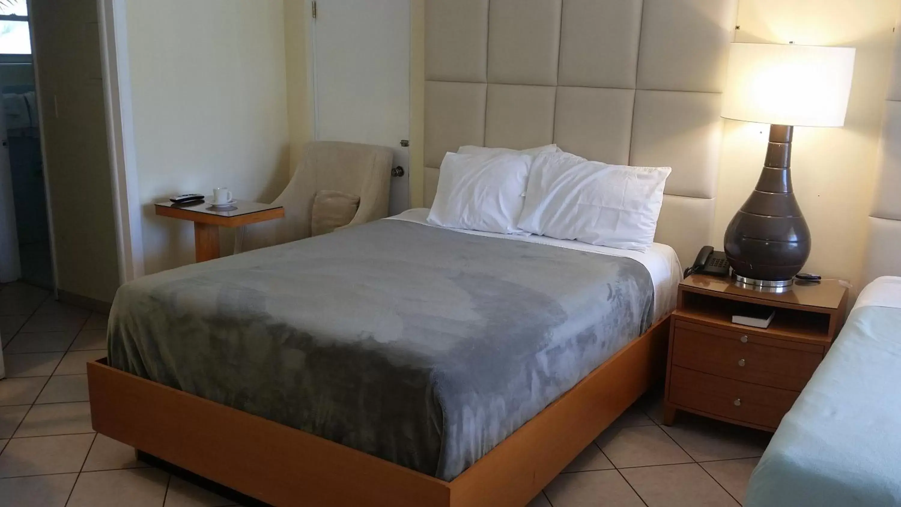 Bed, Room Photo in Ocean Mile Hotel
