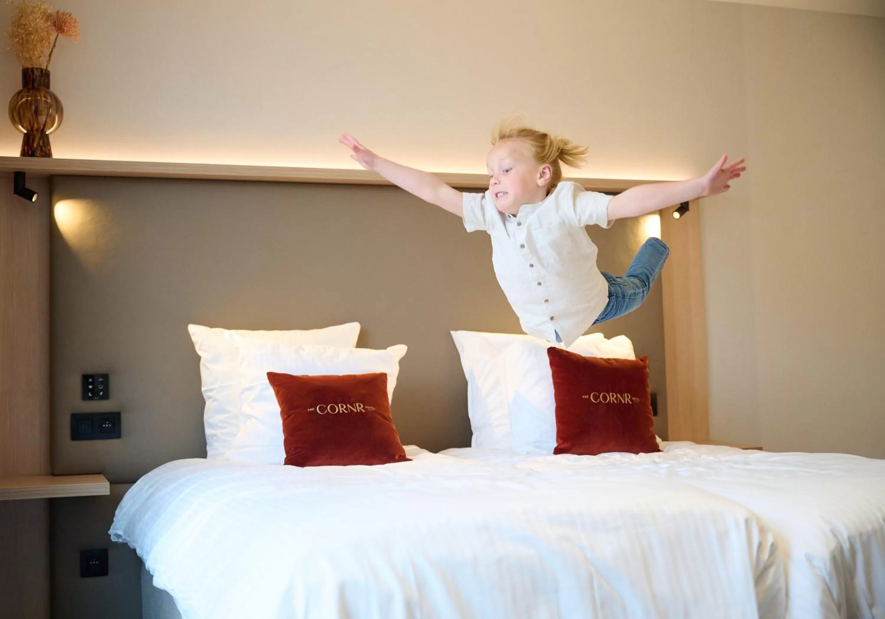 Bed in The CORNR Hotel