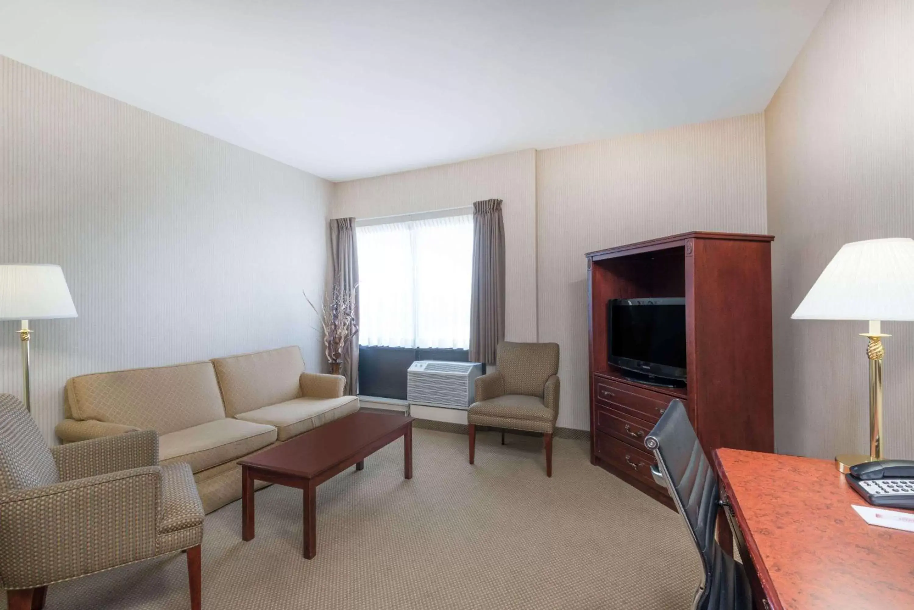 Photo of the whole room, Seating Area in Ramada by Wyndham St. John's