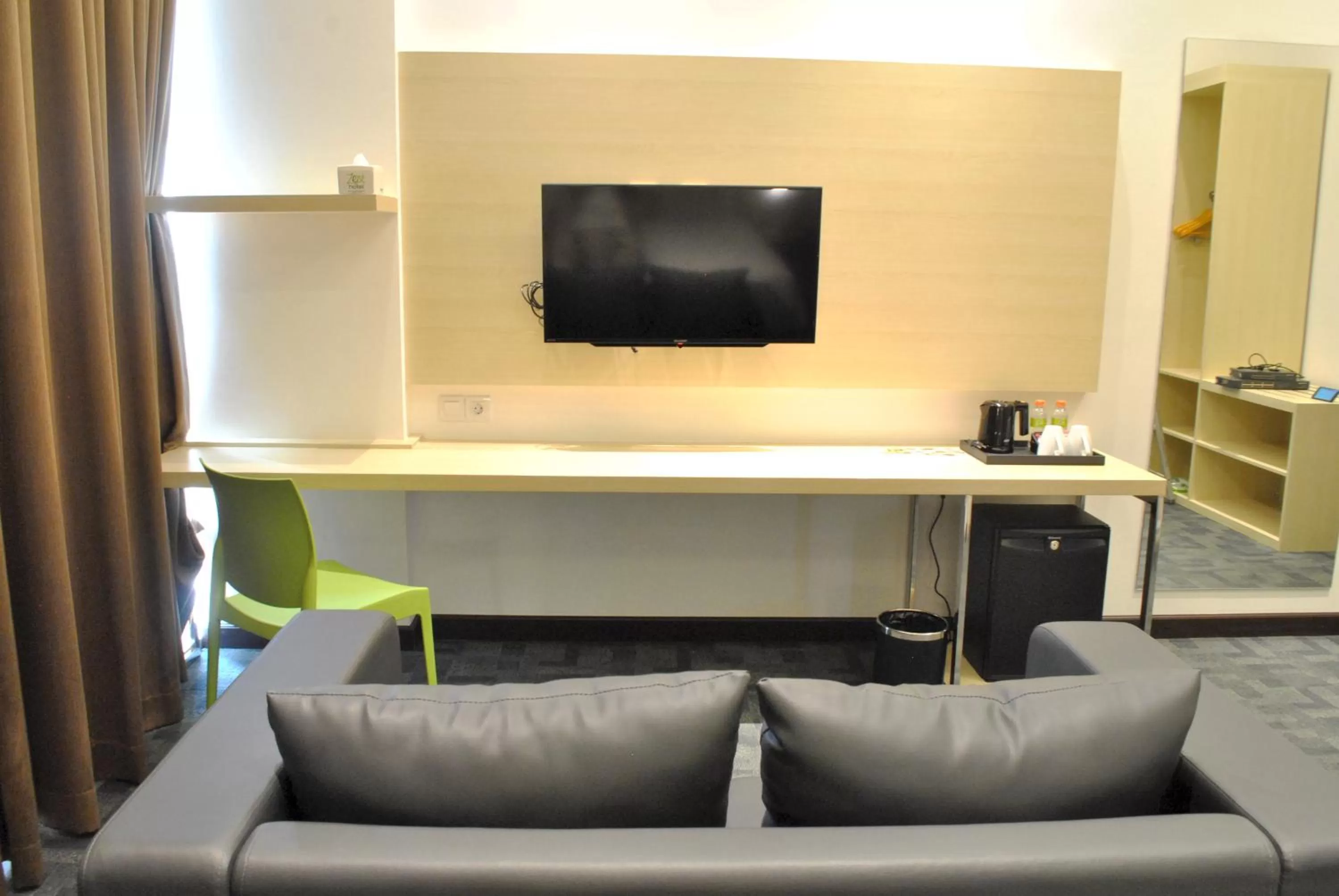 Seating area in Zest Sukajadi Bandung by Swiss-Belhotel International