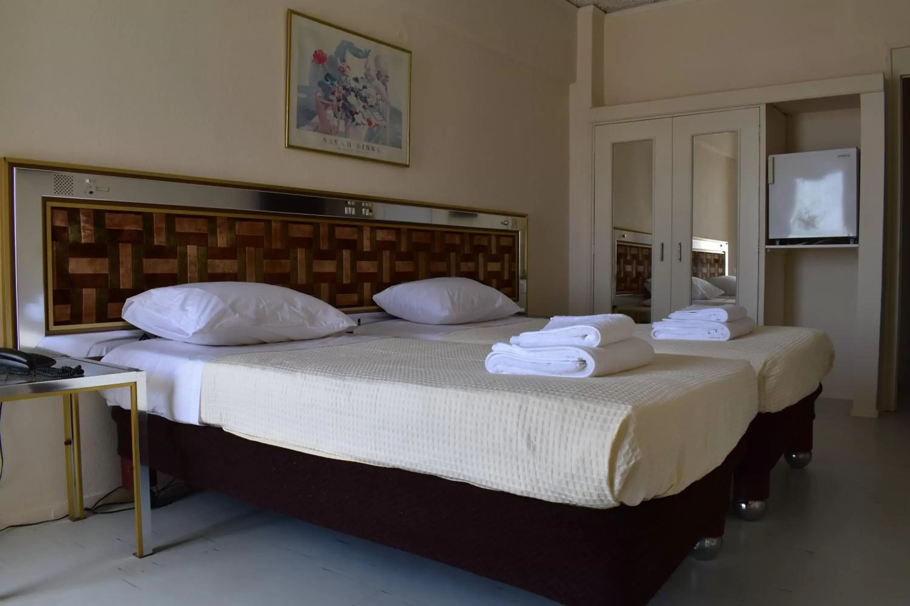 Bed in Hotel Theoxenia