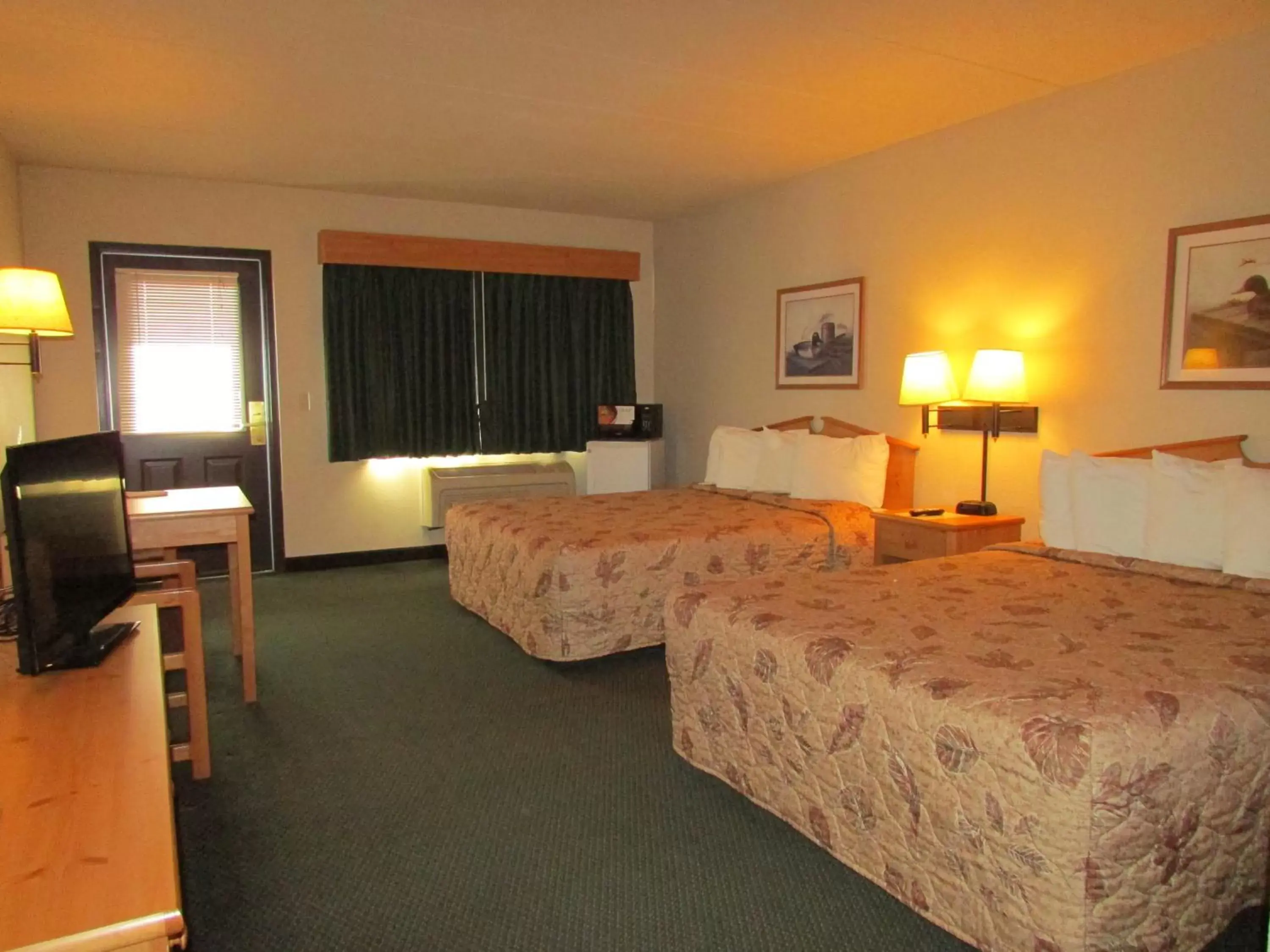 Queen Room with Two Queen Beds and Patio in AmeriVu Inn & Suites