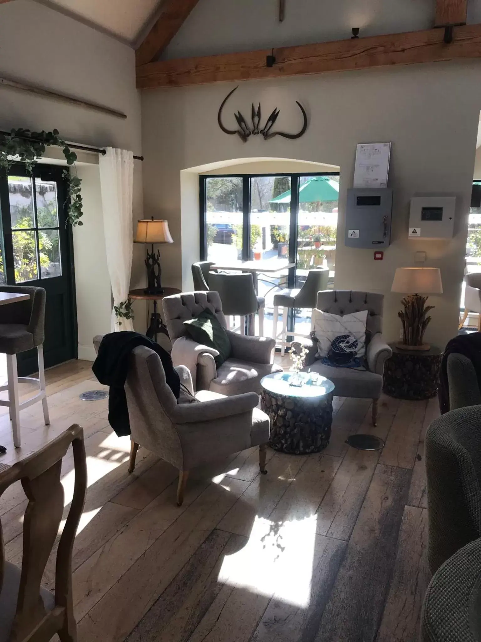 Lounge or bar in The Farmhouse at Bodnant Welsh Food