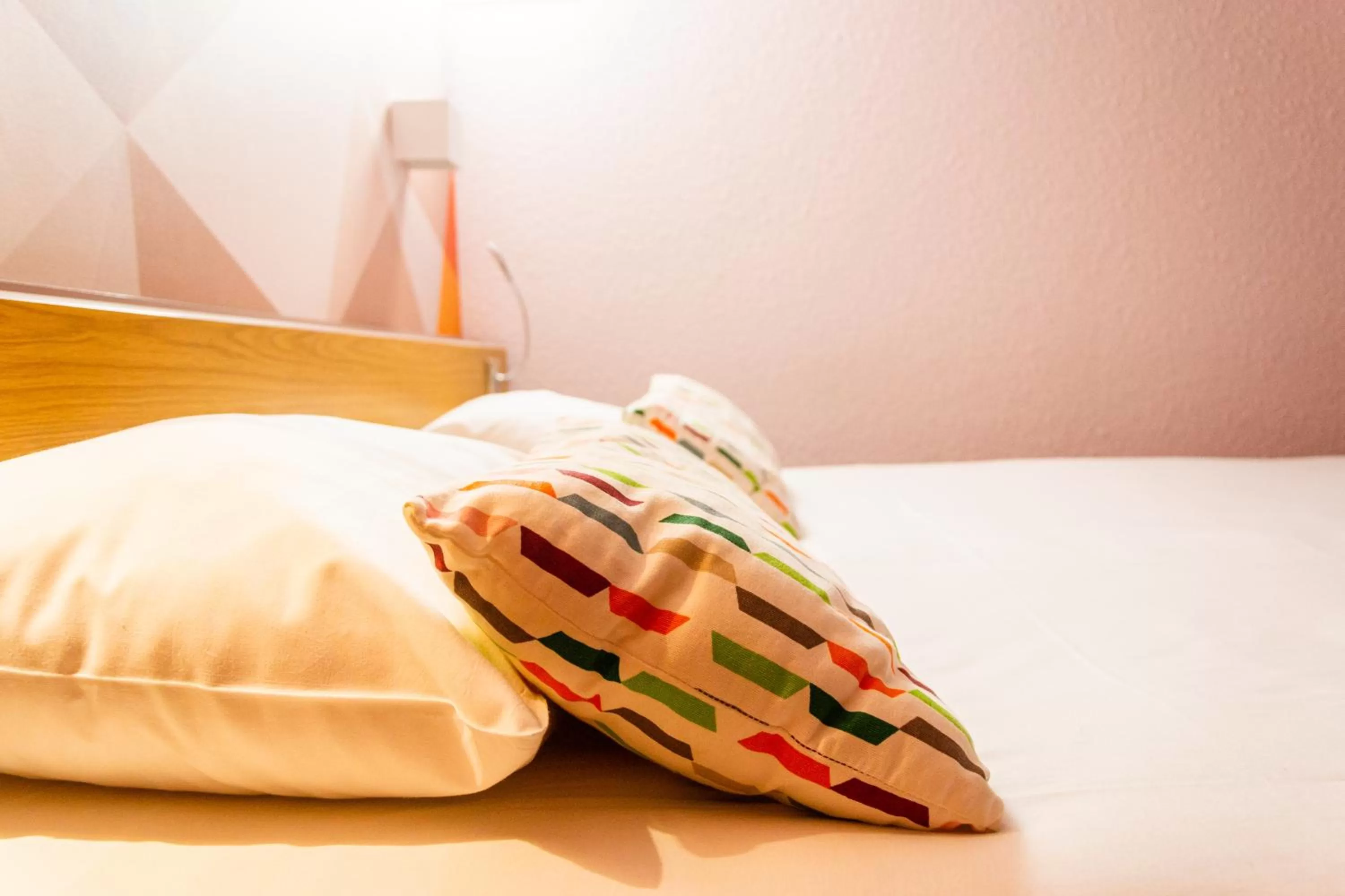 Bed in initial by balladins La Roche-sur-Yon