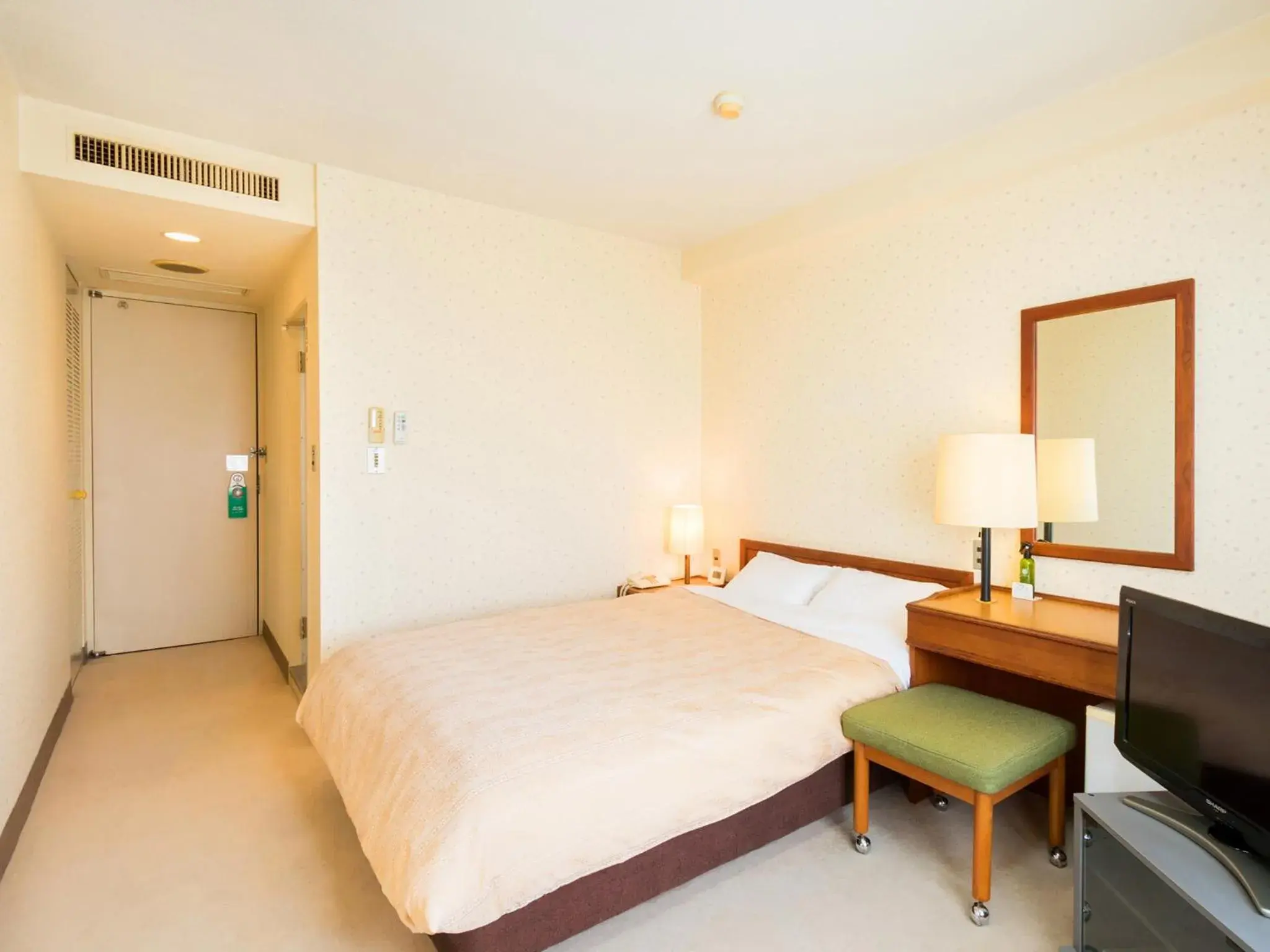 Photo of the whole room, Bed in Yatsushiro Grand Hotel