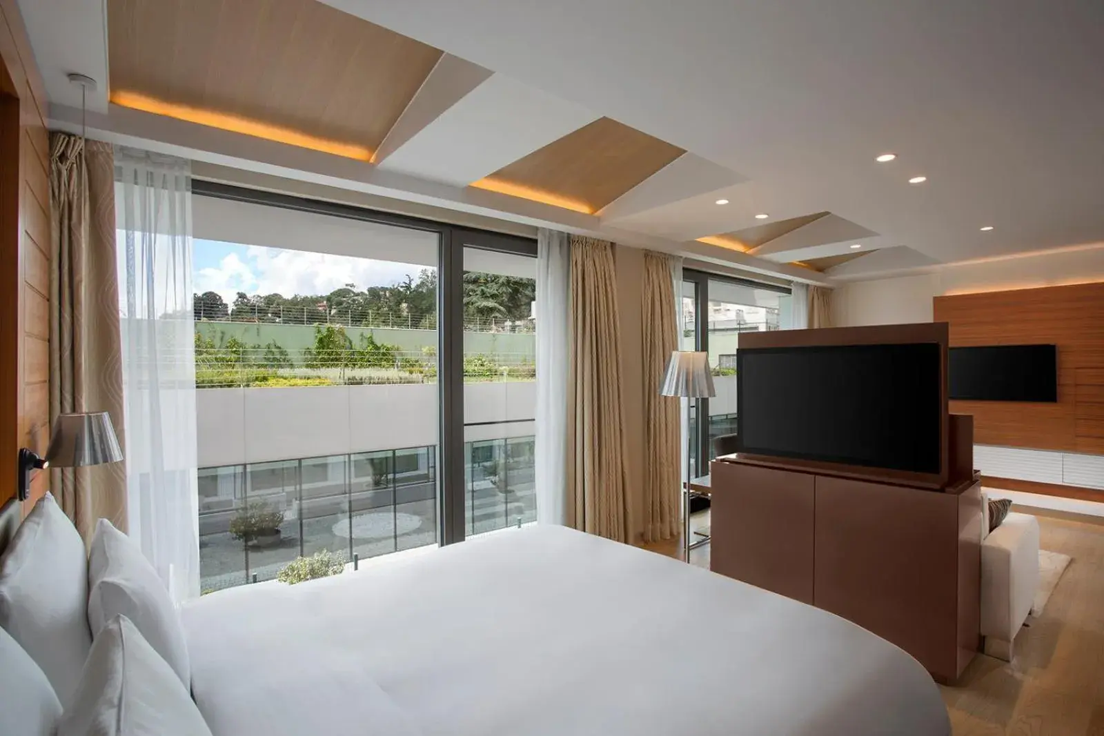 Bed, TV/Entertainment Center in The Grand Tarabya Hotel