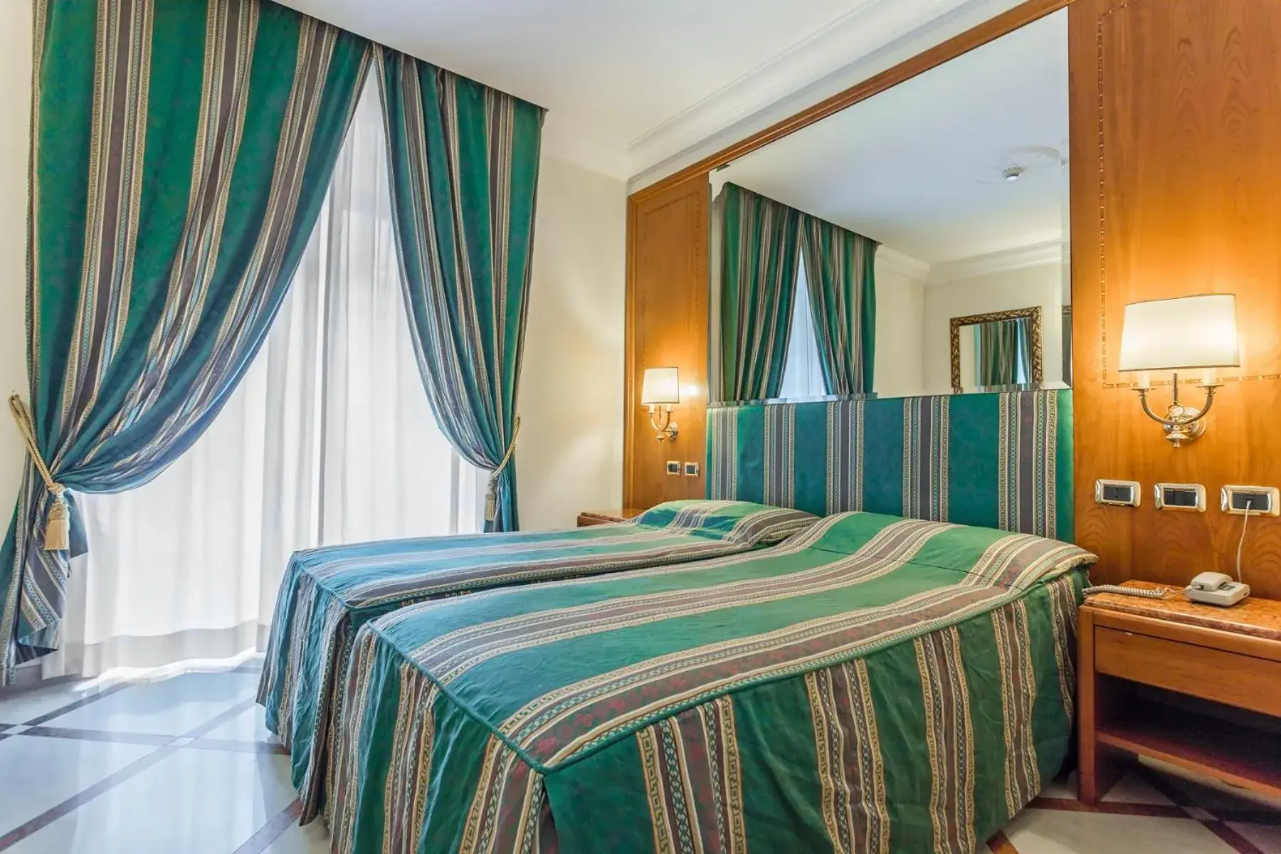 Bedroom, Bed in Raeli Hotel Regio