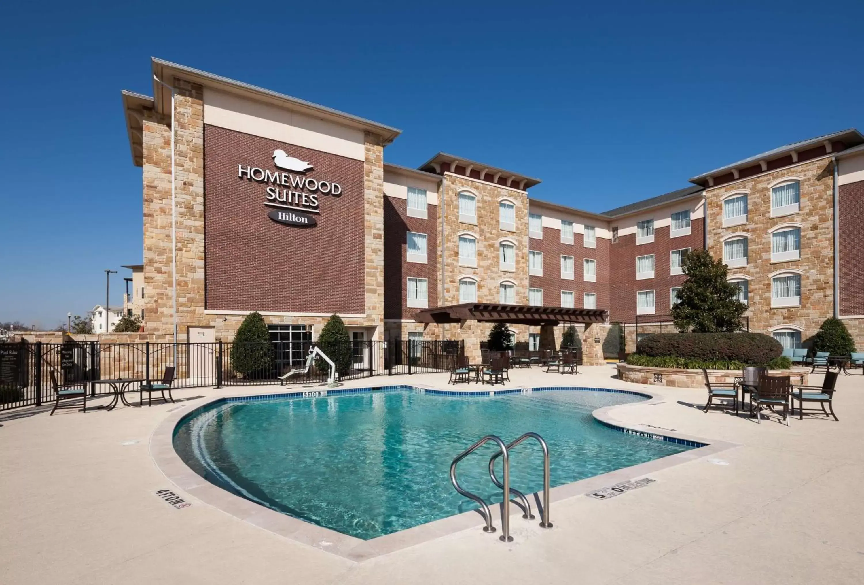 Pool view, Property Building in Homewood Suites Denton