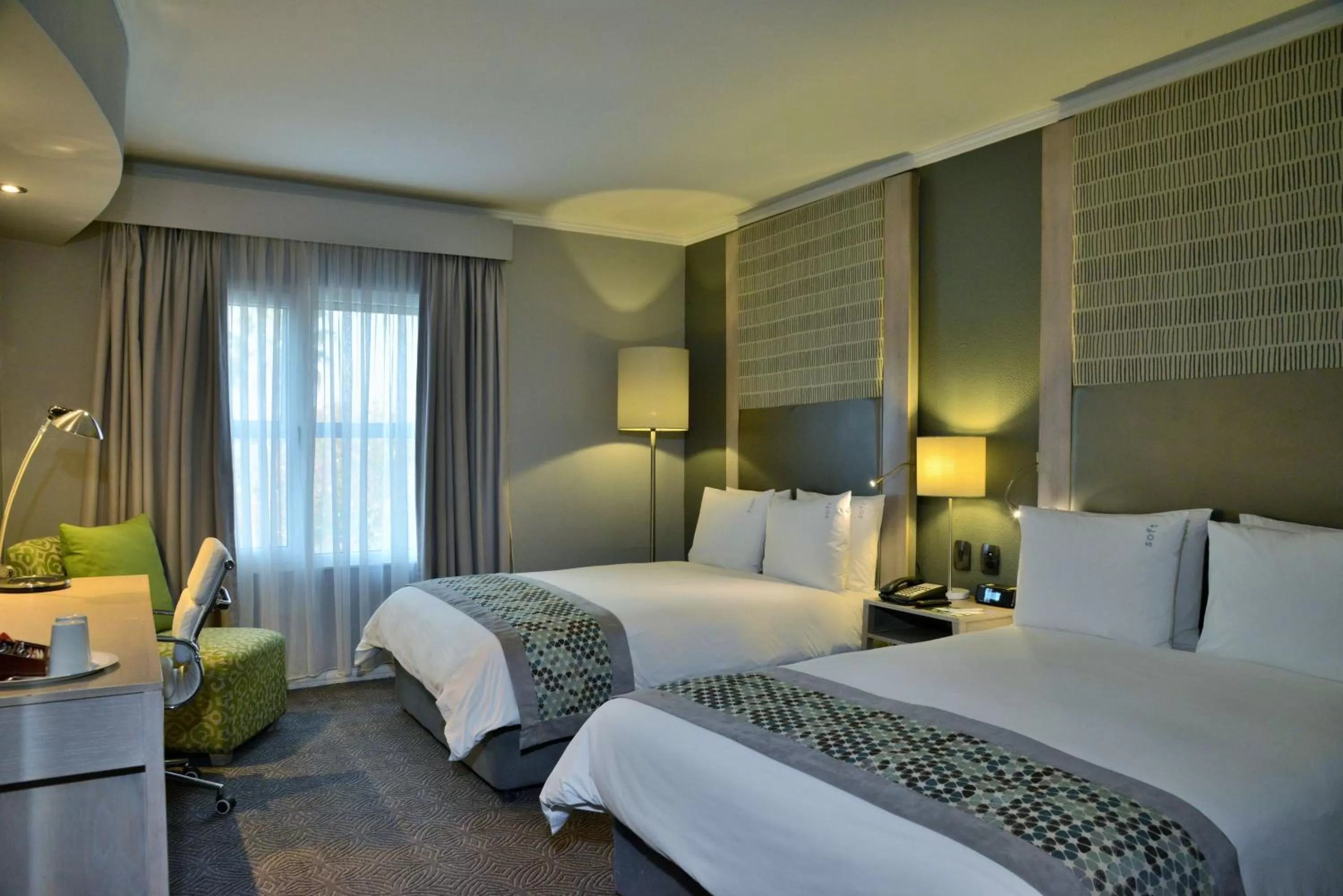 Bed in Holiday Inn Johannesburg OR Tambo Airport Hotel by IHG