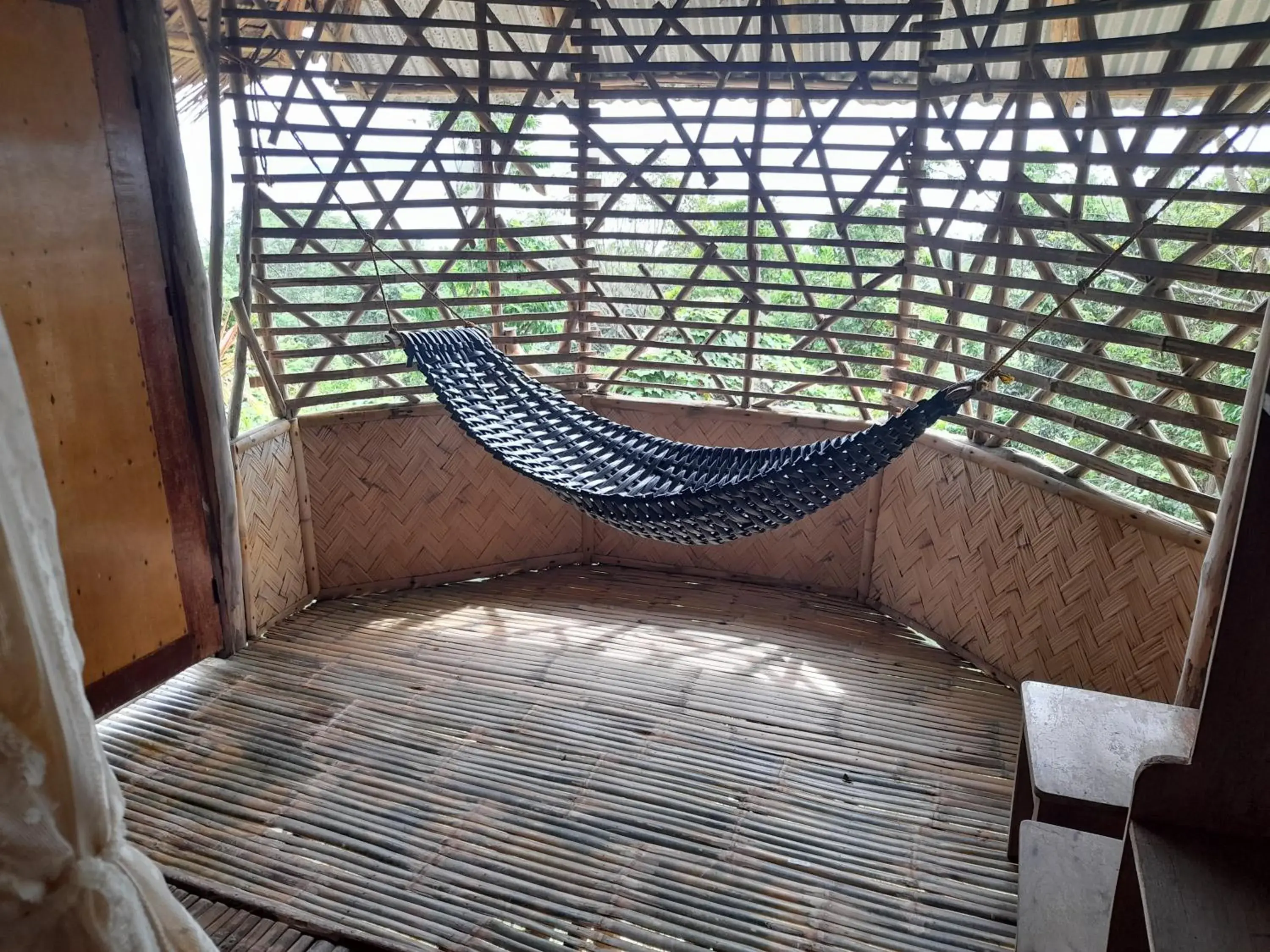 Seating area in Erlittop Garden Eco Lodge