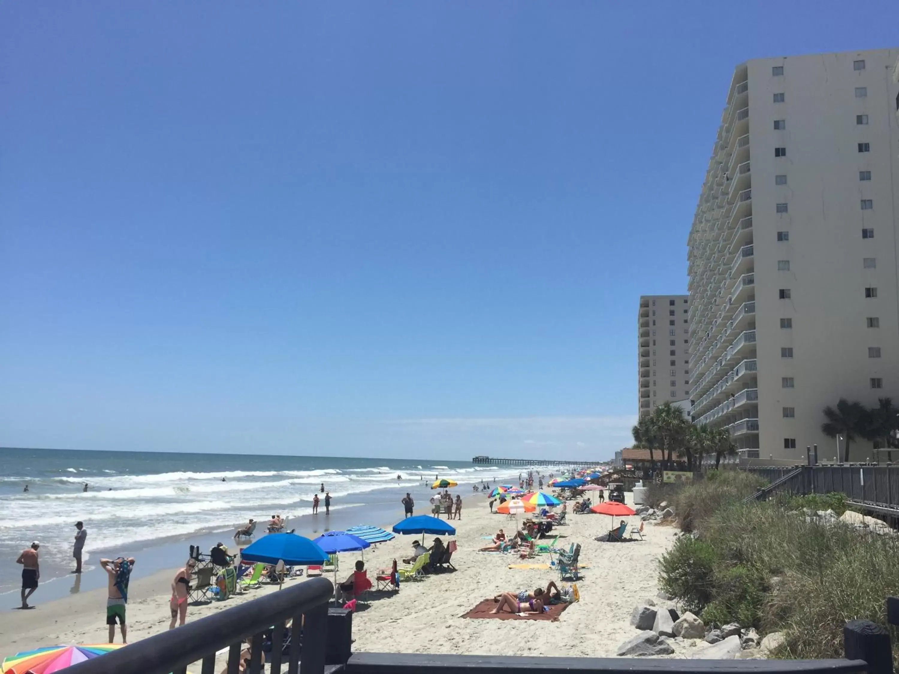 Facade/entrance, Beach in Garden City Inn