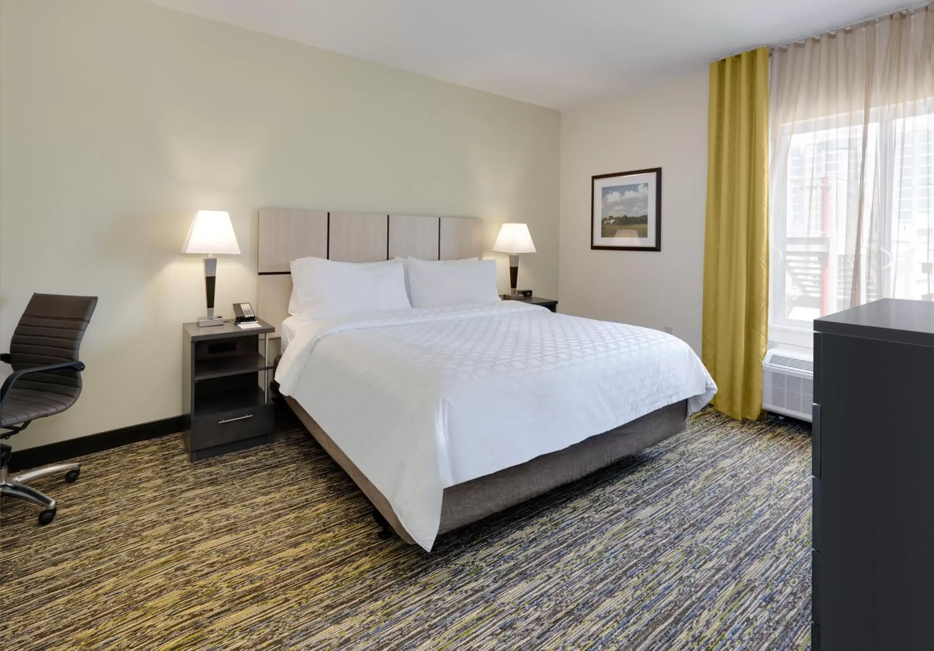 Photo of the whole room, Bed in Candlewood Suites - Farmers Branch, an IHG Hotel