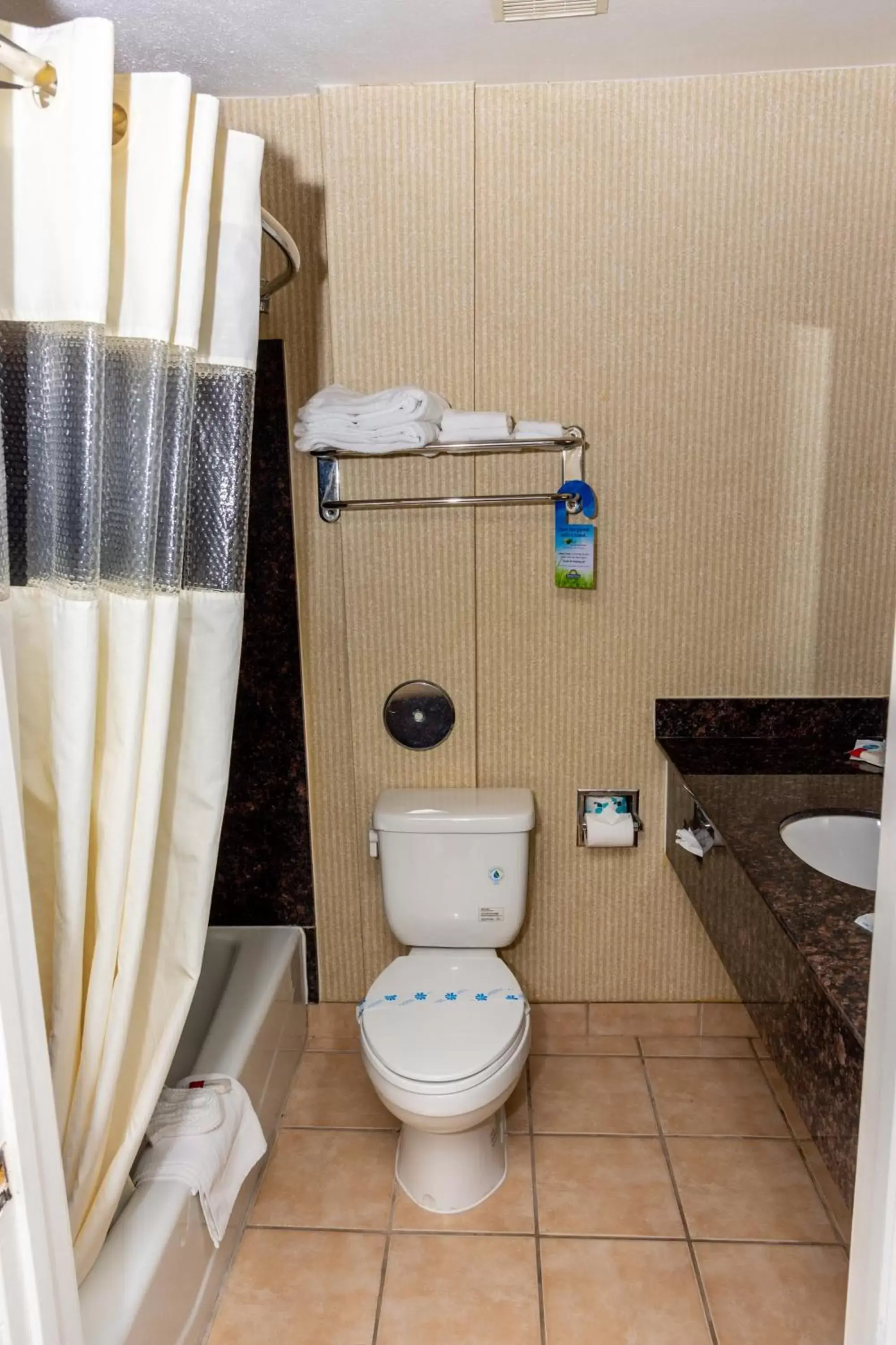 Bathroom in Days Inn & Suites by Wyndham Artesia