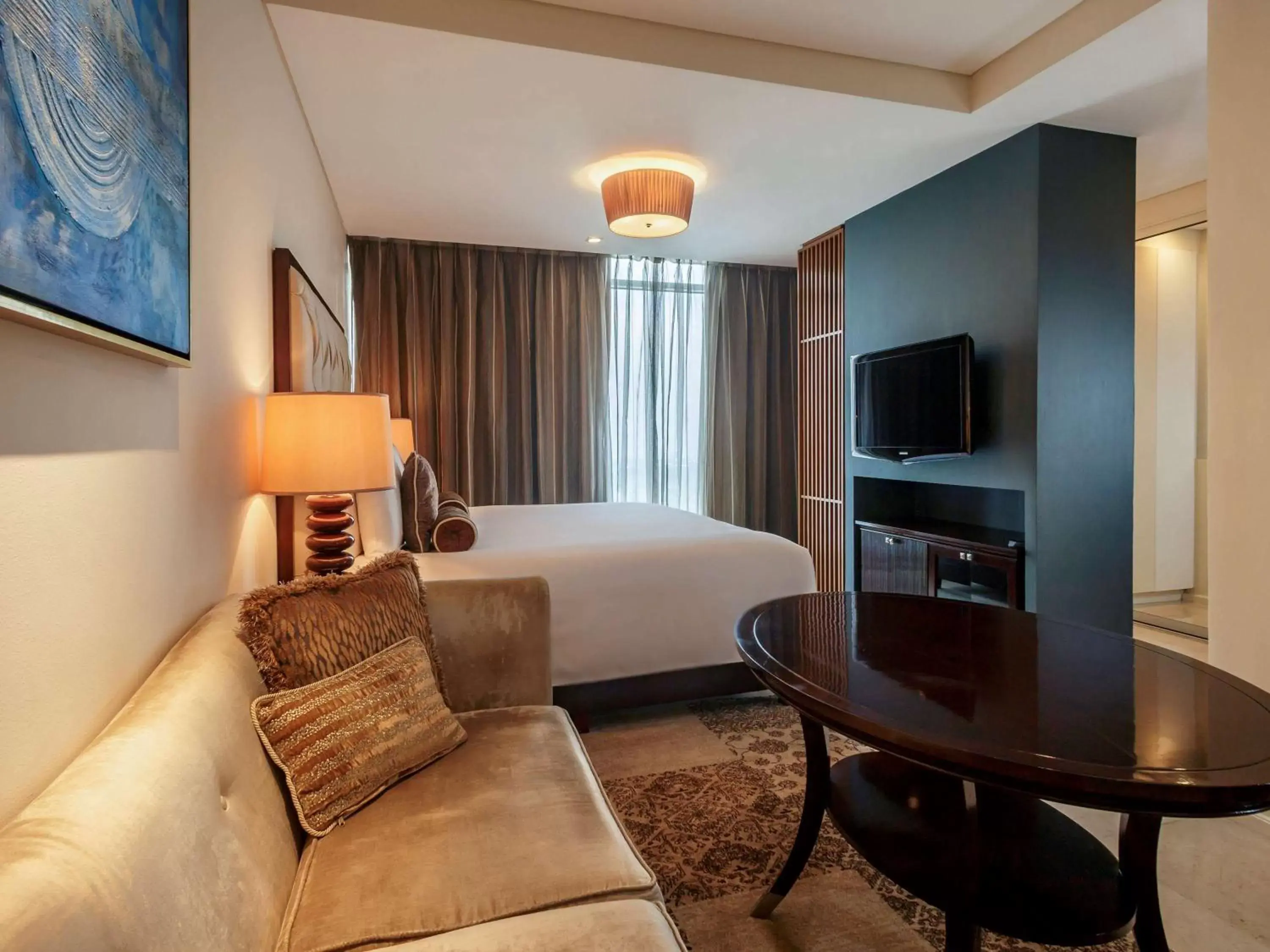 Bedroom, Seating Area in Joy-Nostalg Hotel & Suites Manila Managed by AccorHotels