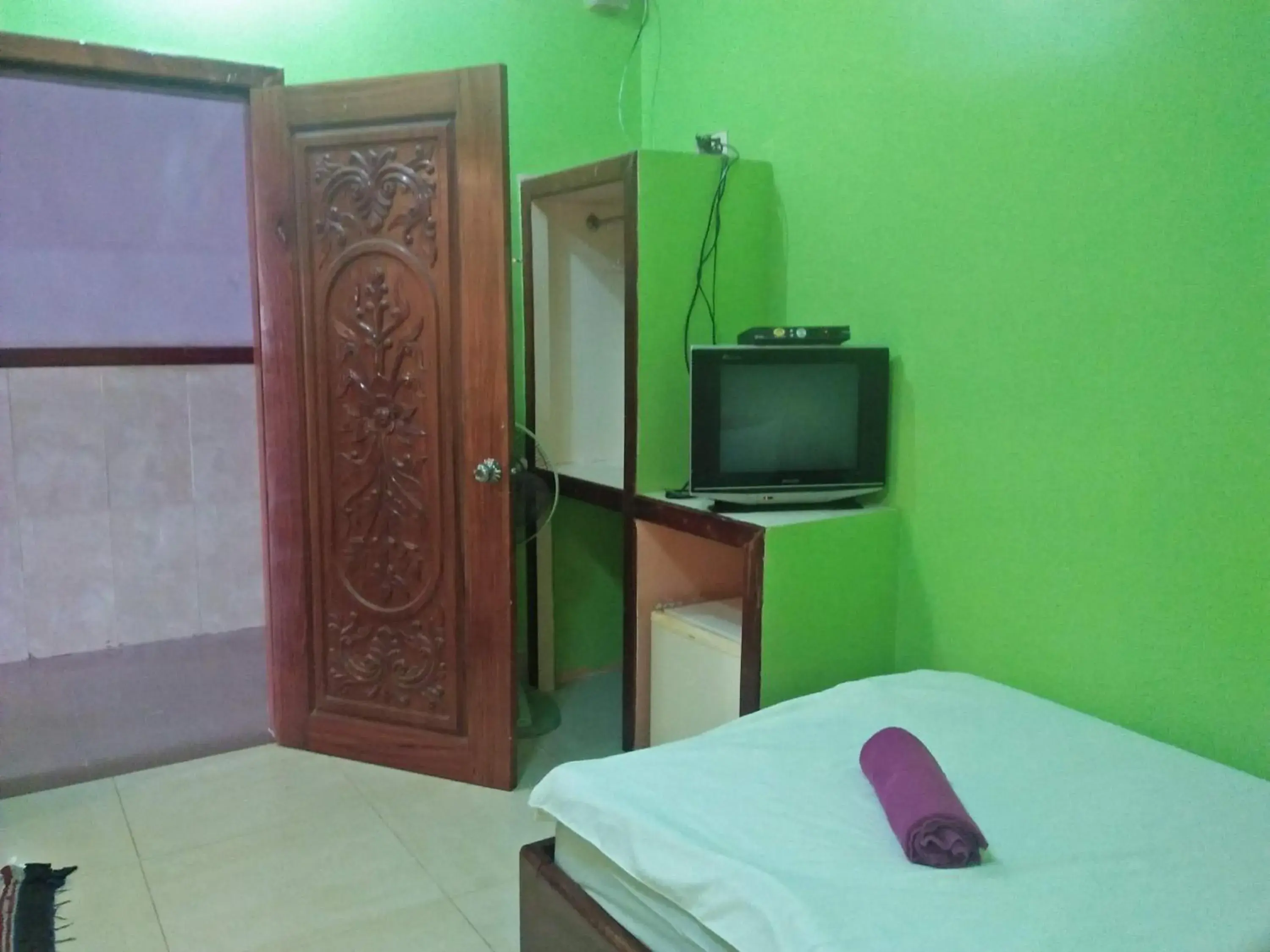 Bedroom, TV/Entertainment Center in Sam So Guesthouse