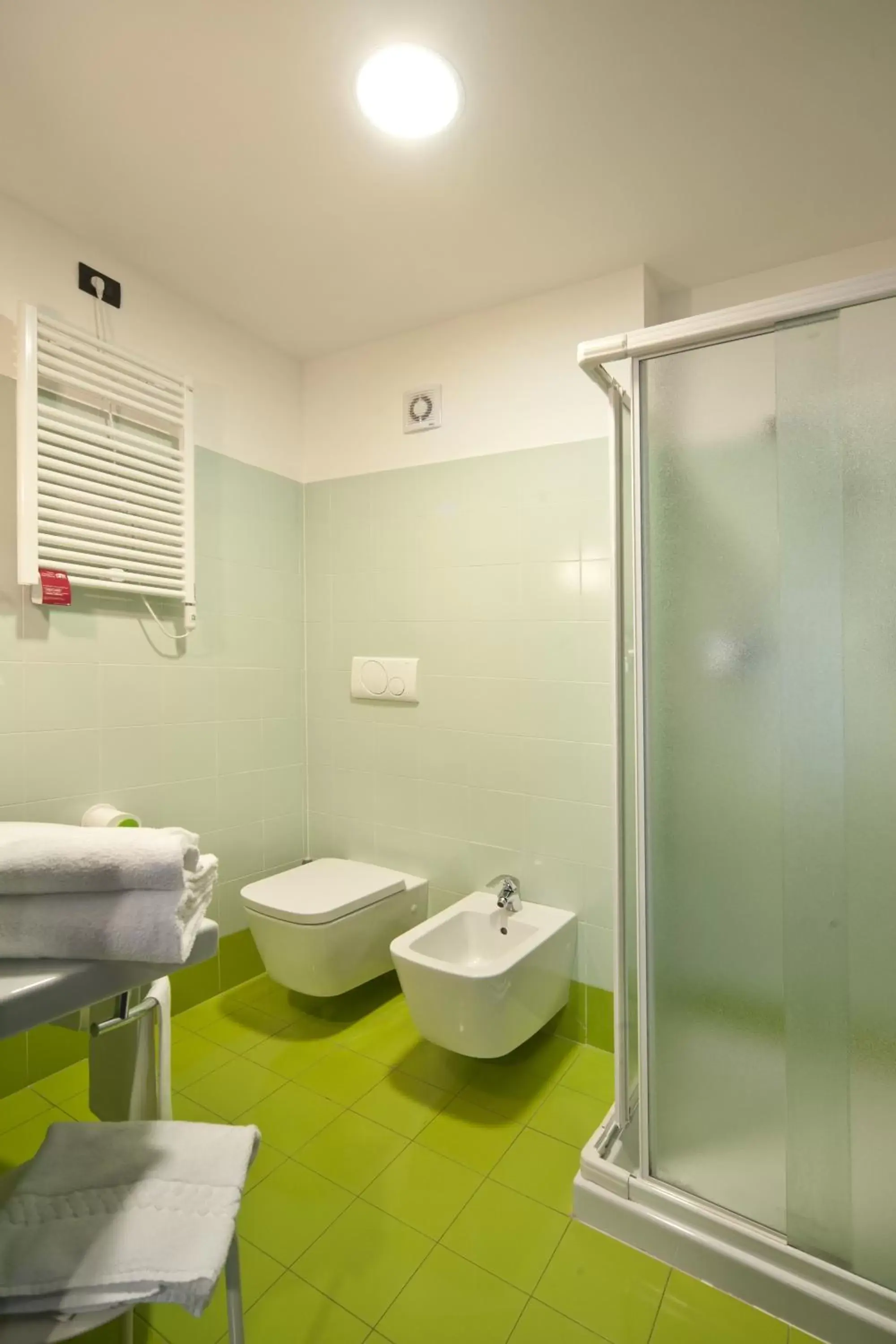 Bathroom in Ibis Styles Parma Toscanini