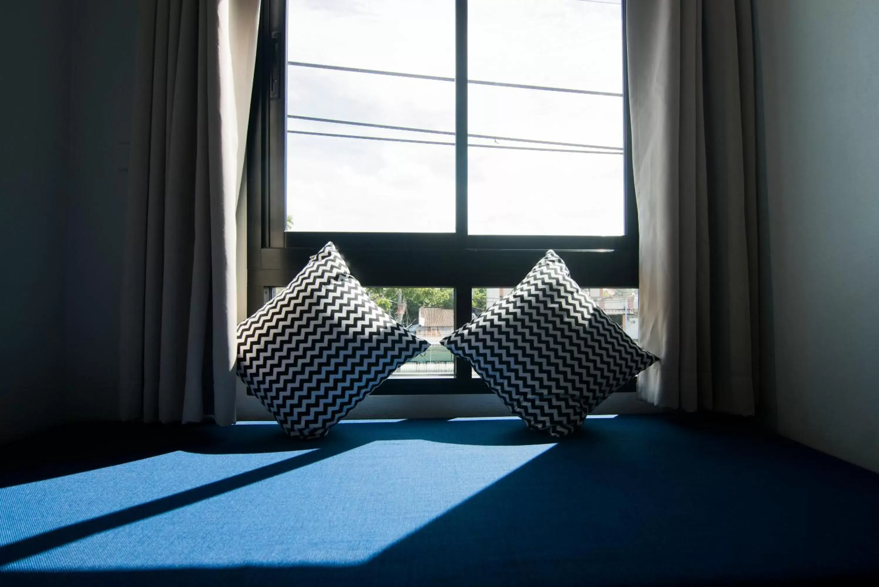 Seating area, Bed in Sleep Whale Hotel